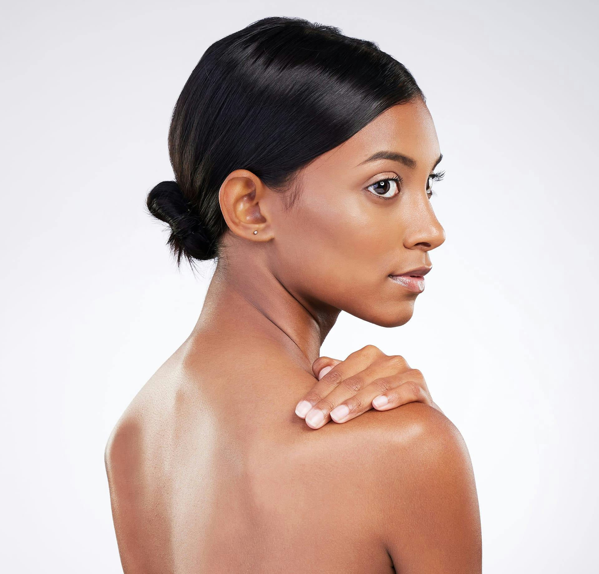 woman glancing over shoulder