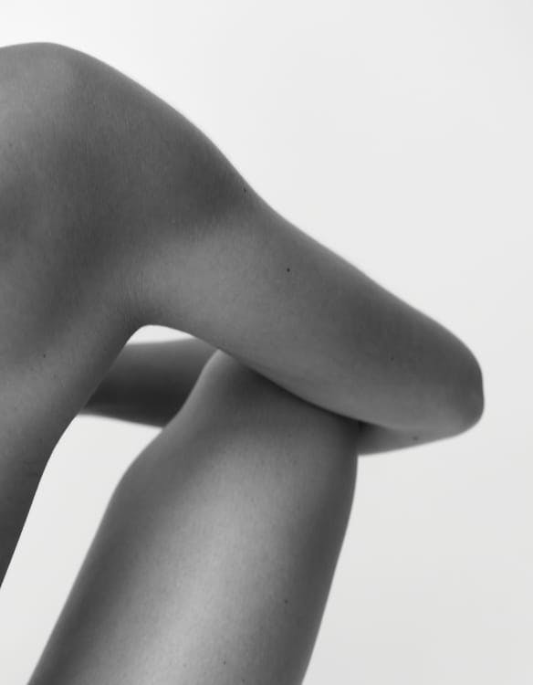 Close-up of an arm and a leg