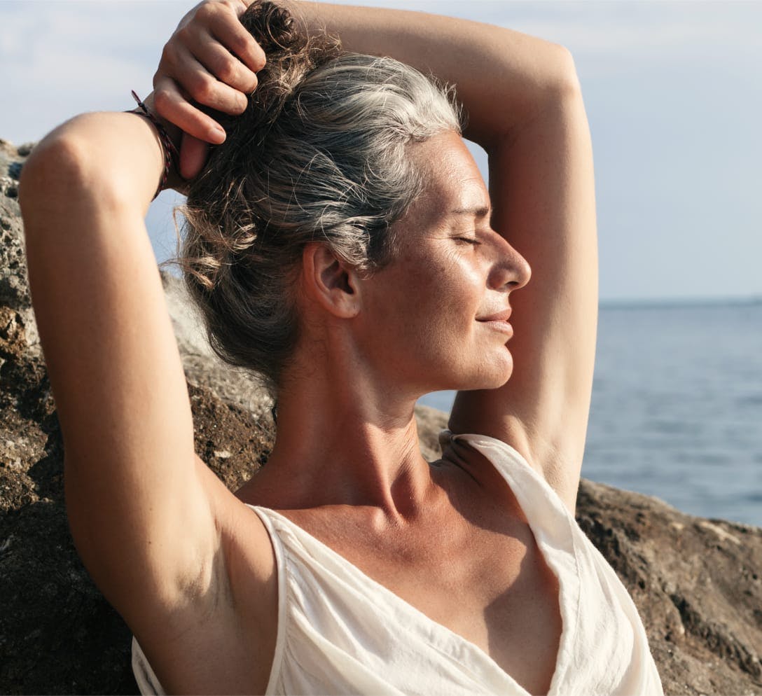 older woman at the beach