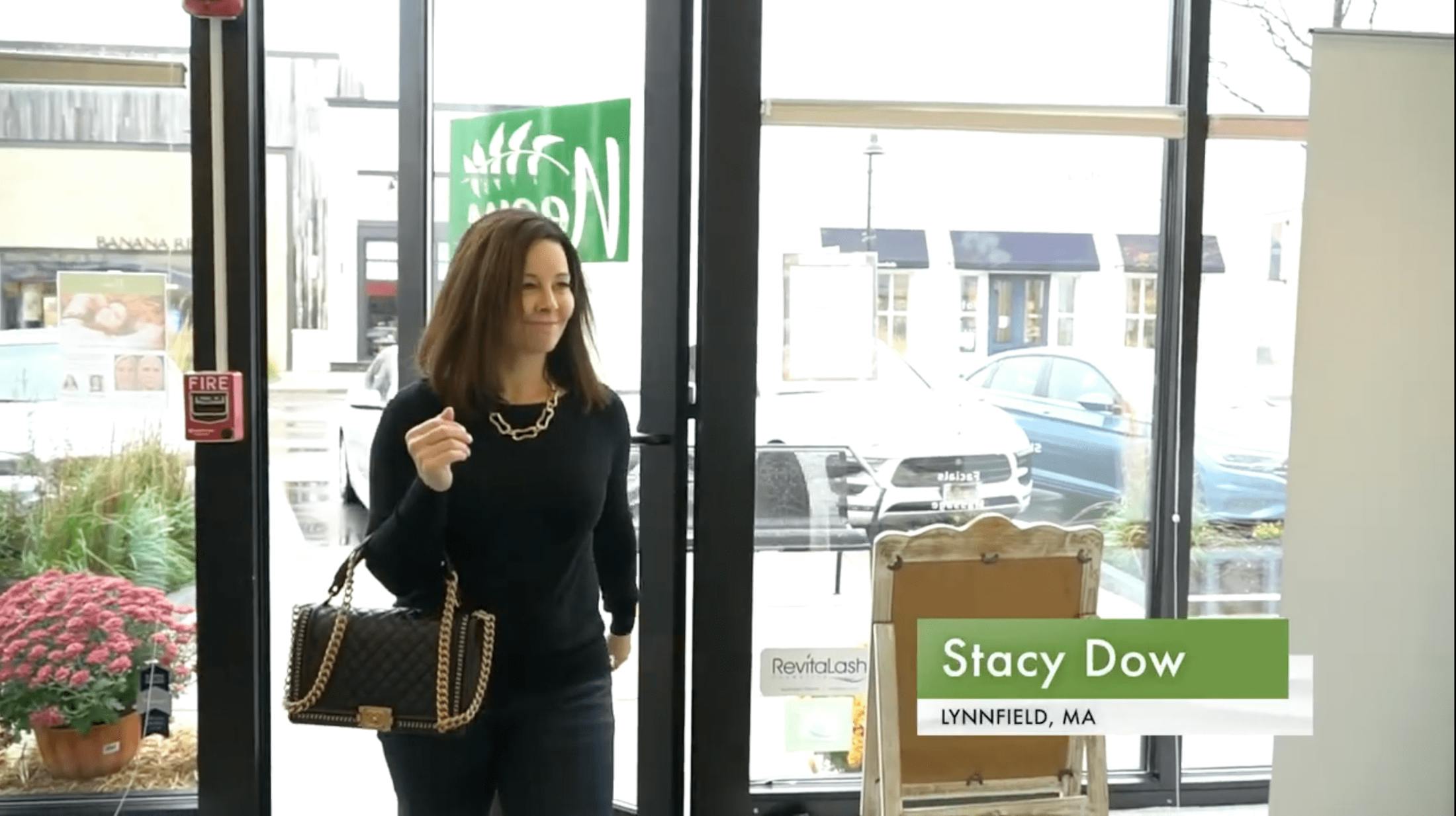 woman walking into Neem Medical Spa