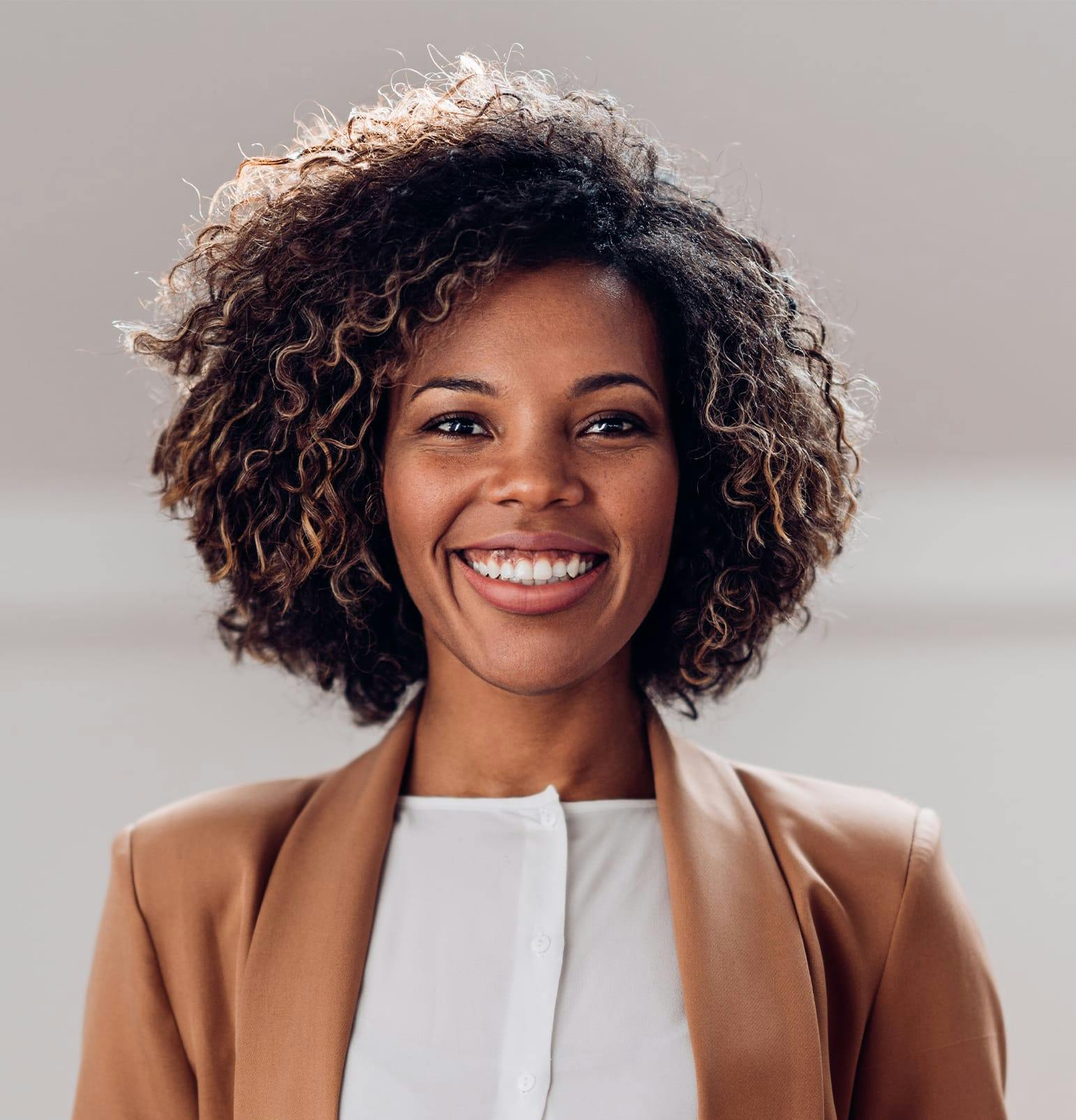 woman with afro smiling