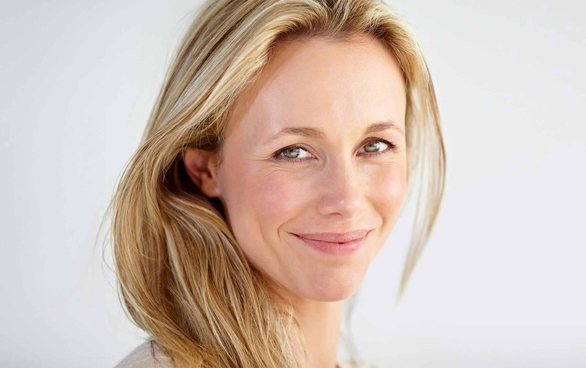 woman looking forward smiling