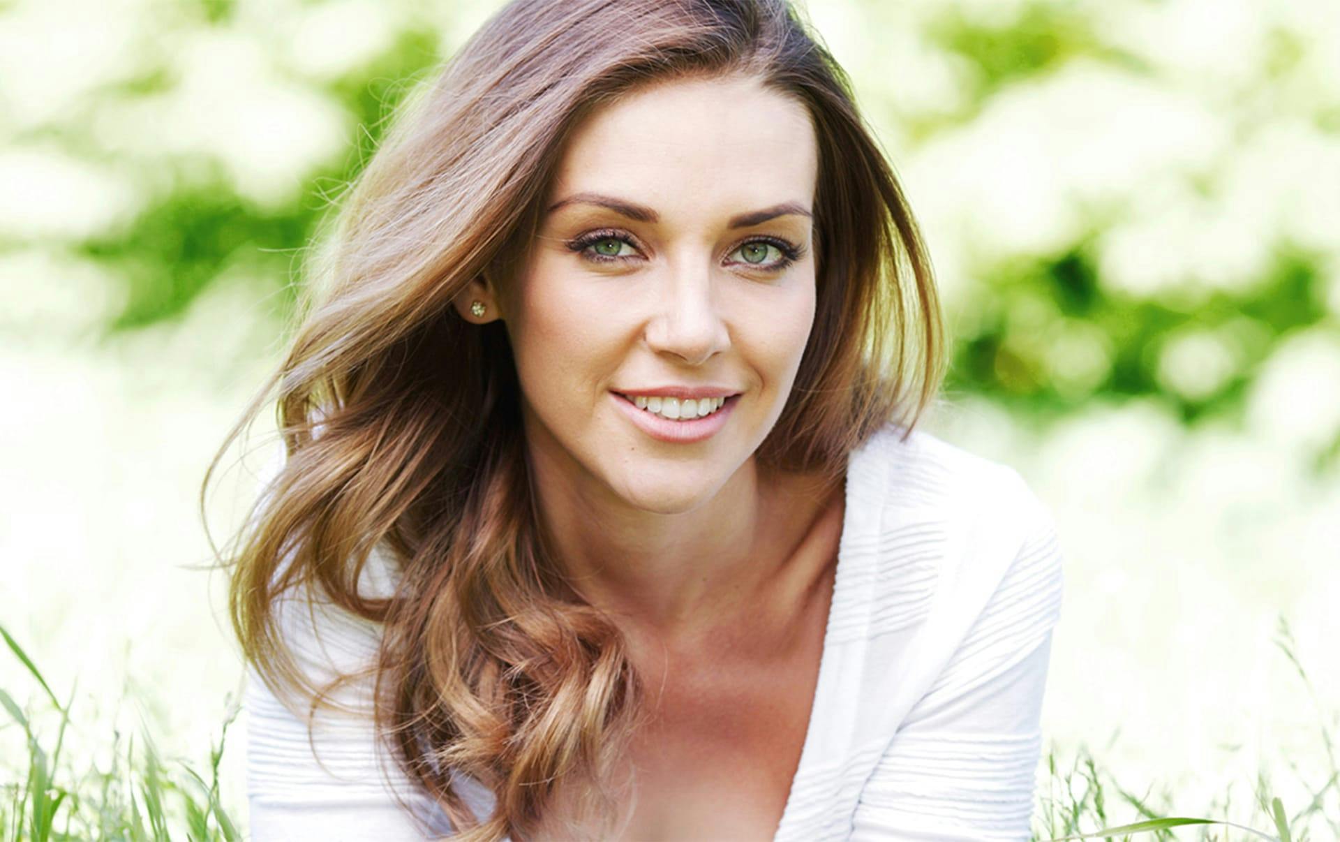 woman with green eyes smiling