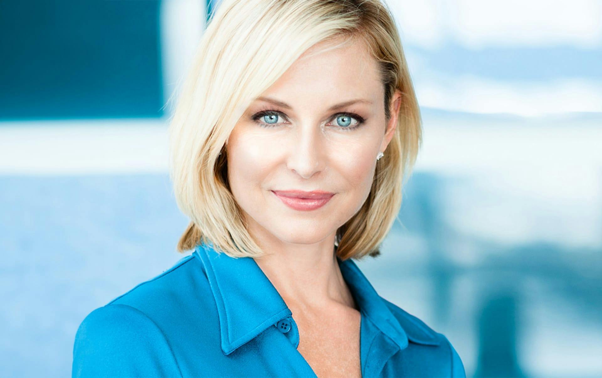 woman with short hair smiling