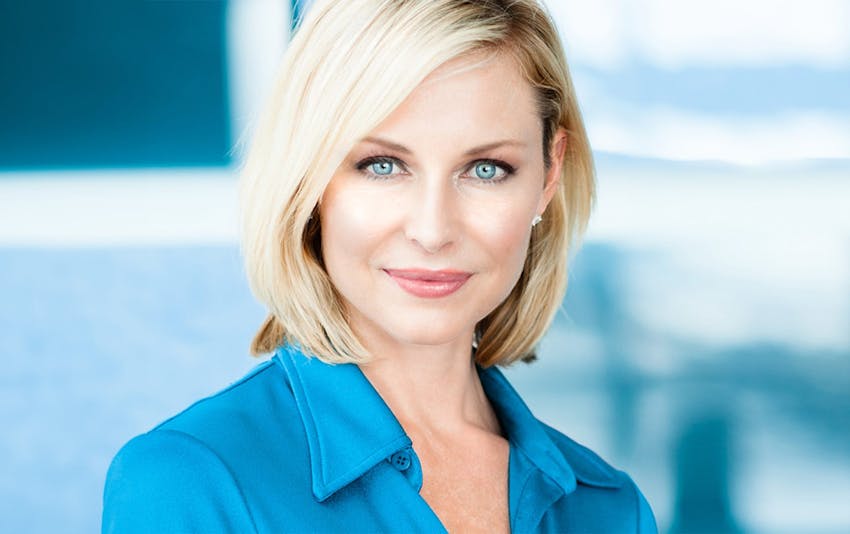woman with short hair smiling