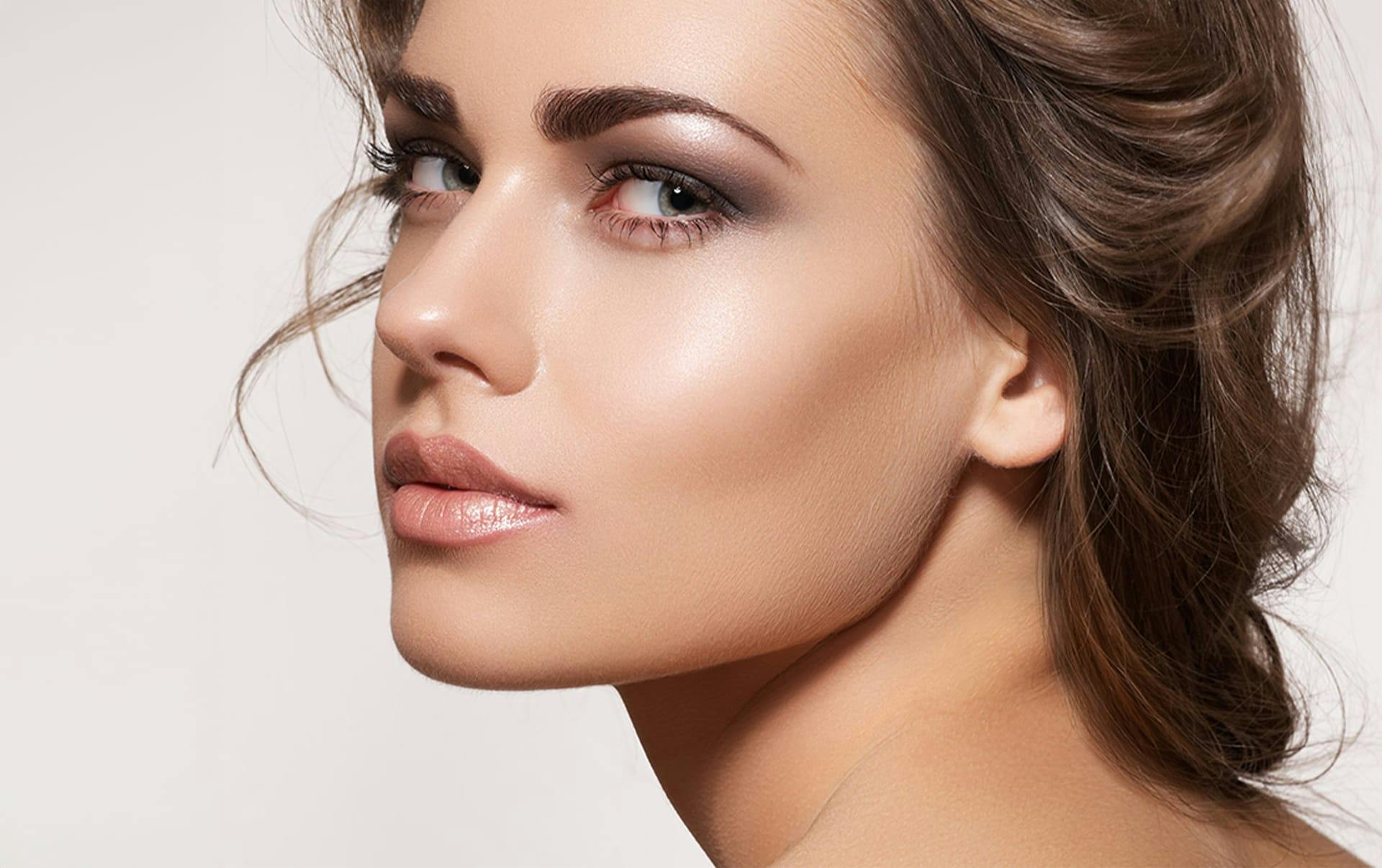woman facing the left looking foward with blue eyes