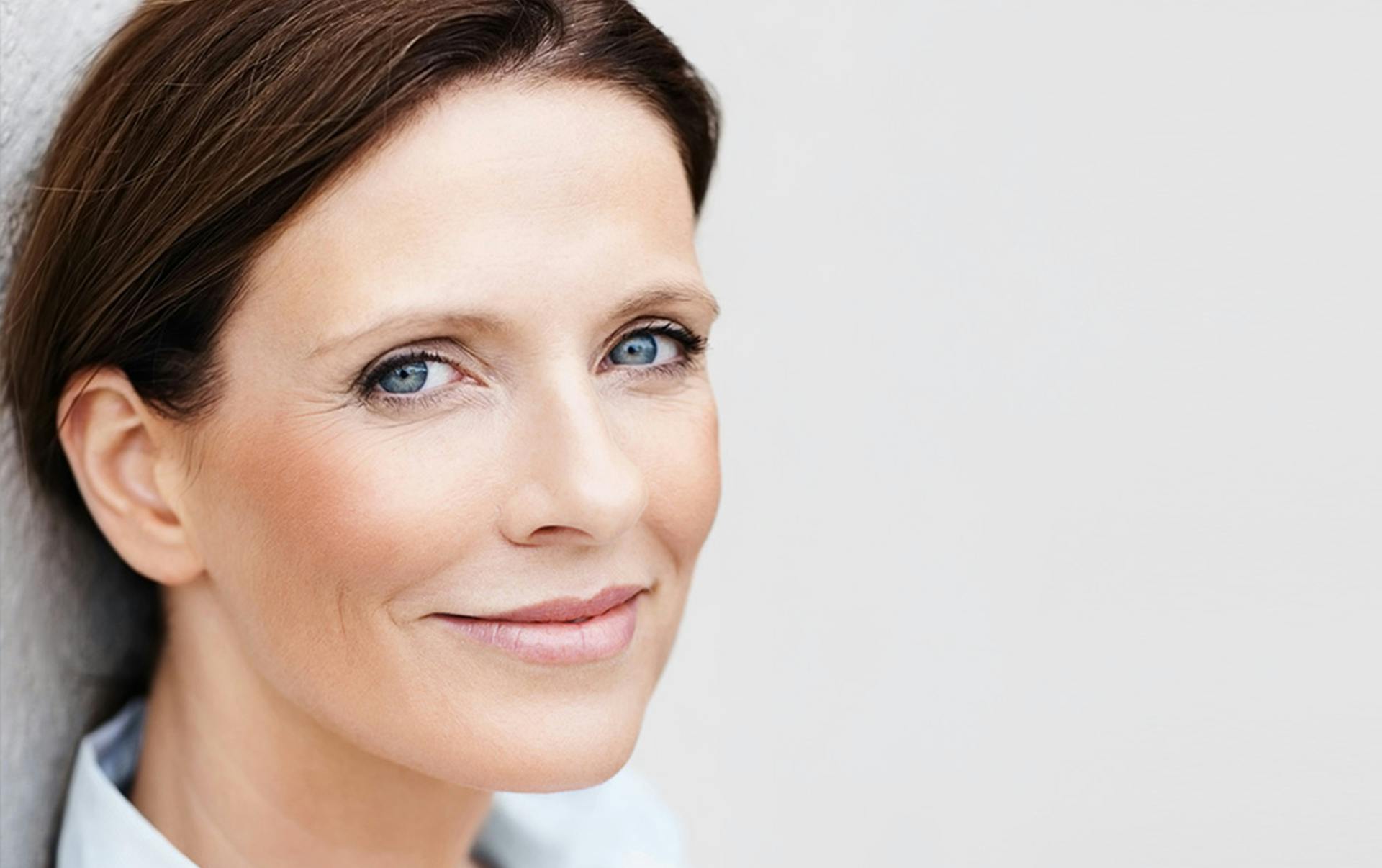 woman smirking
