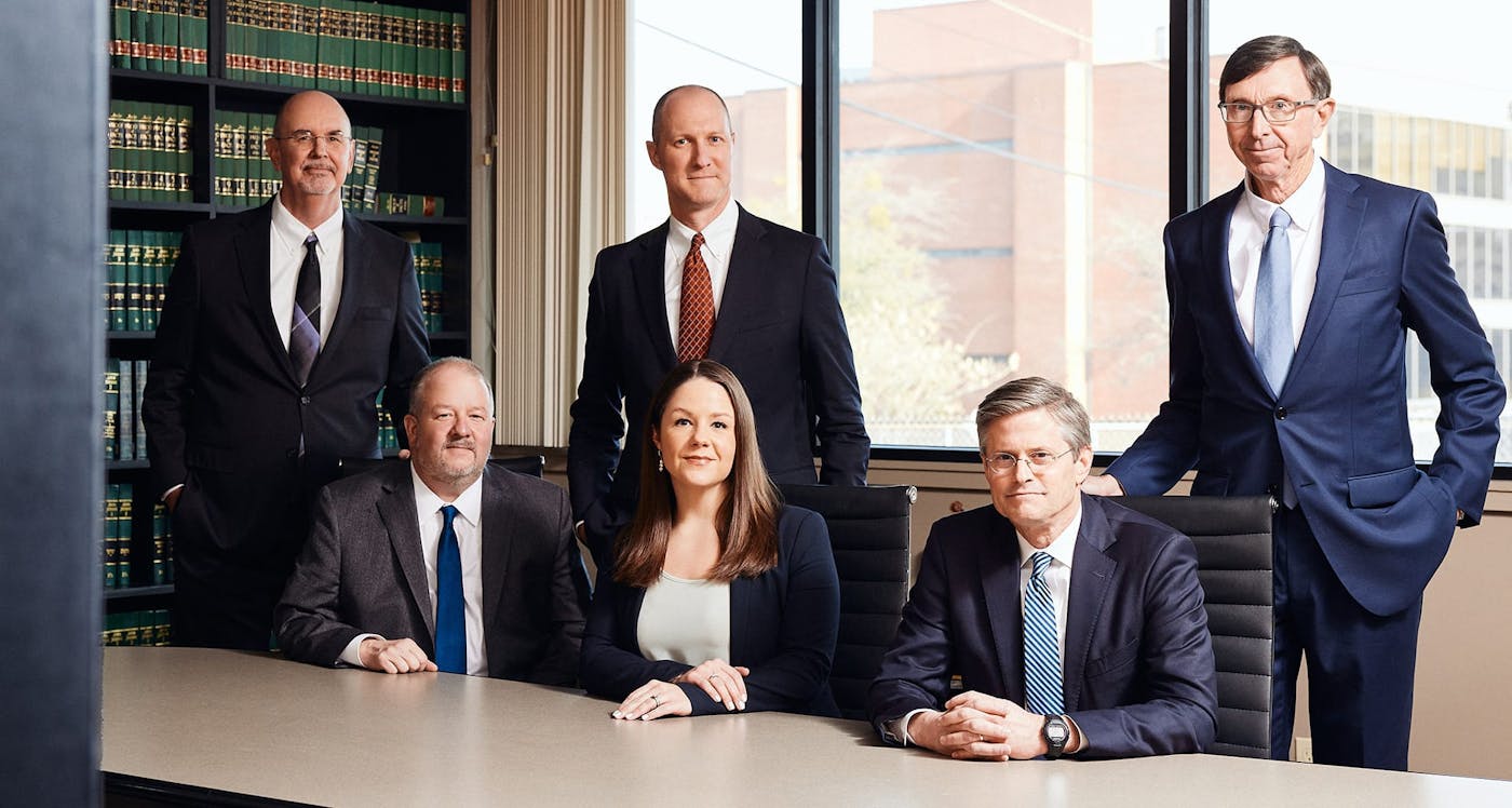 6 attorneys sitting looking forward