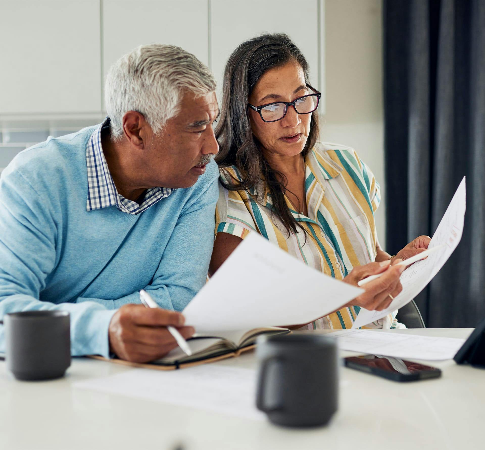 older couple looking at paperwork together