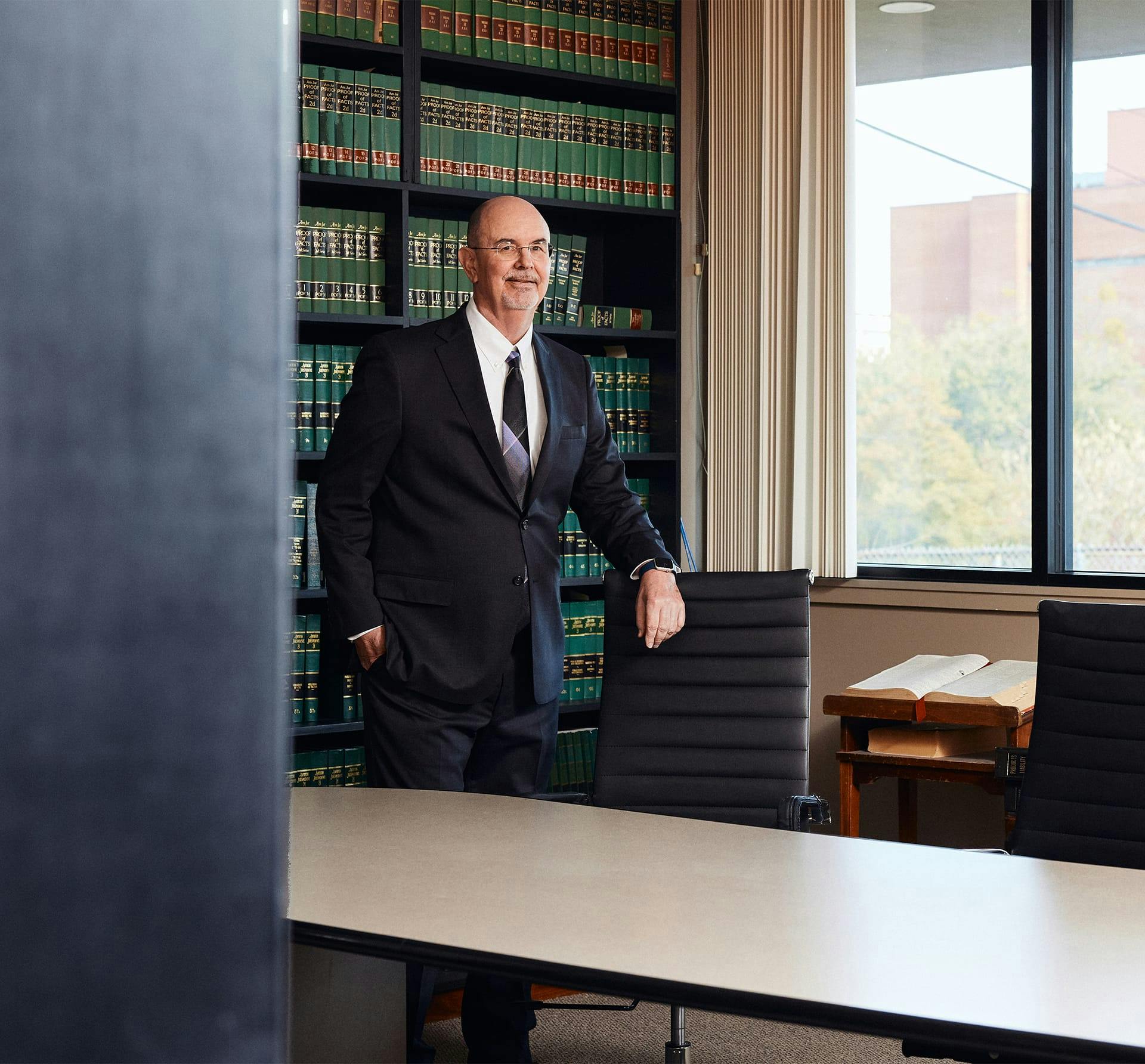 man in office in suit