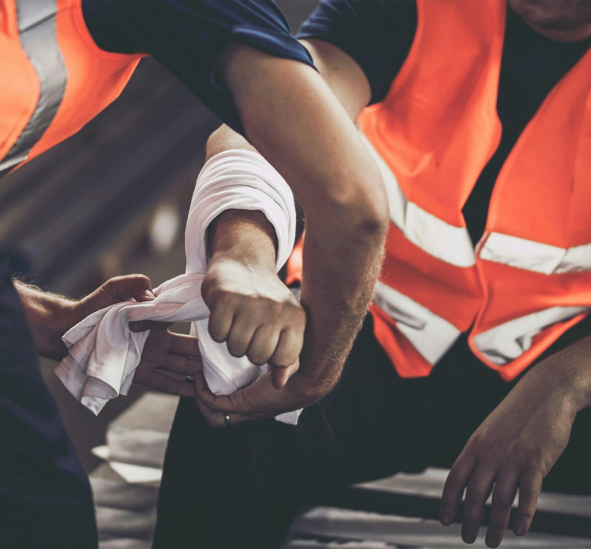 worker wrapping his coworkers arm