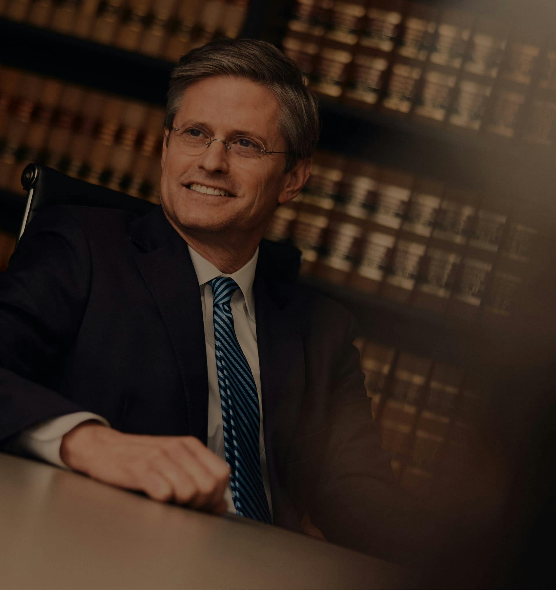 Reviews background photo of McMath Woods attorneys