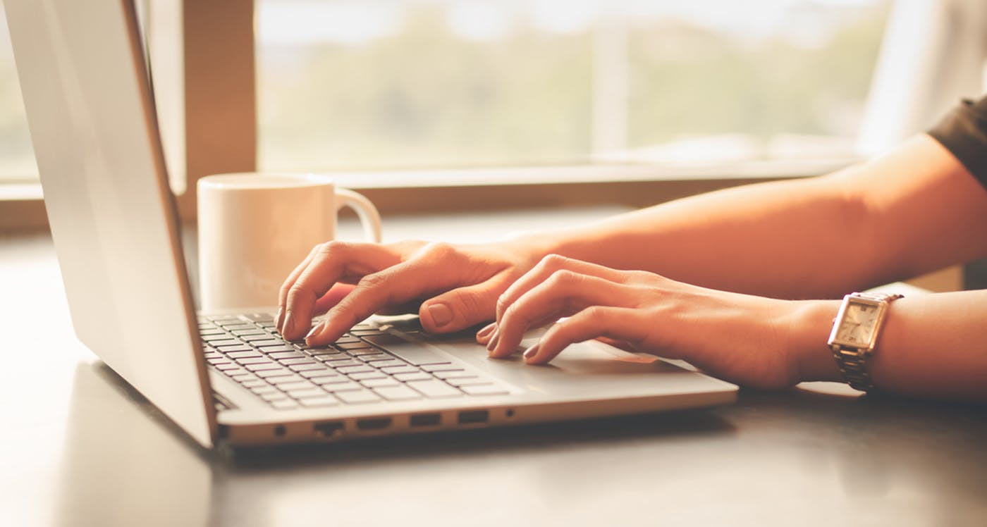 people sitting at table speaking