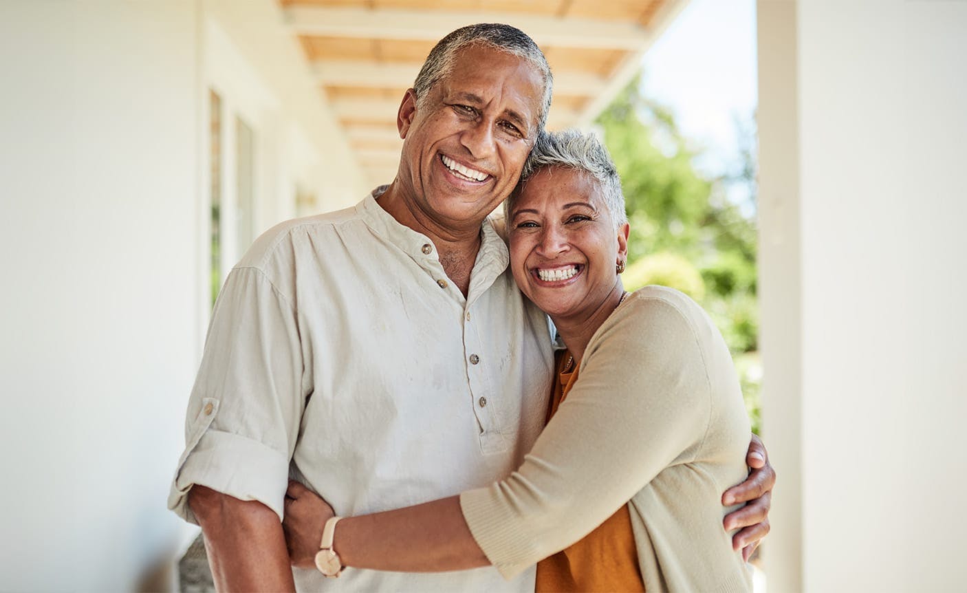 older couple hugging each other