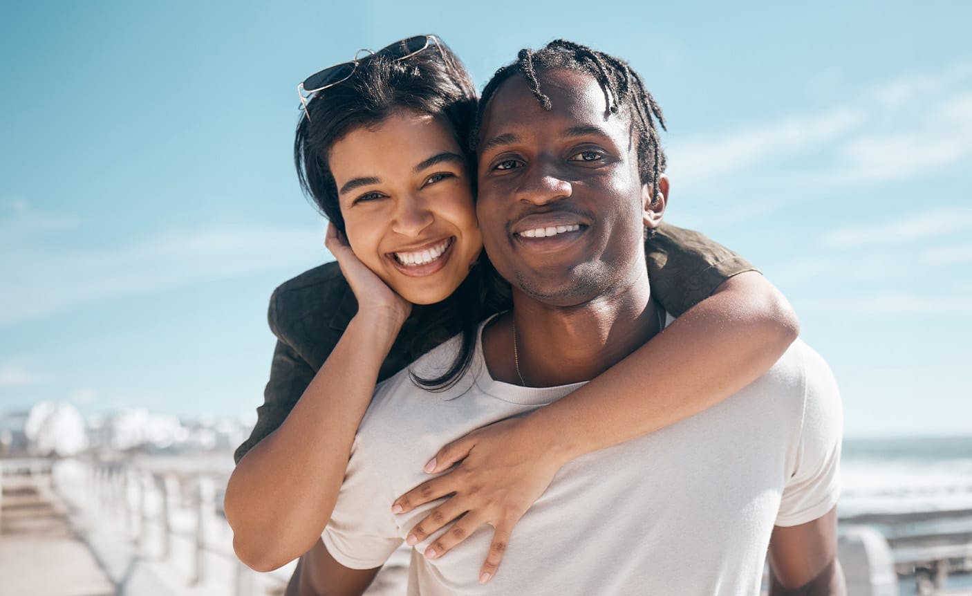 woman hugging a man from behind