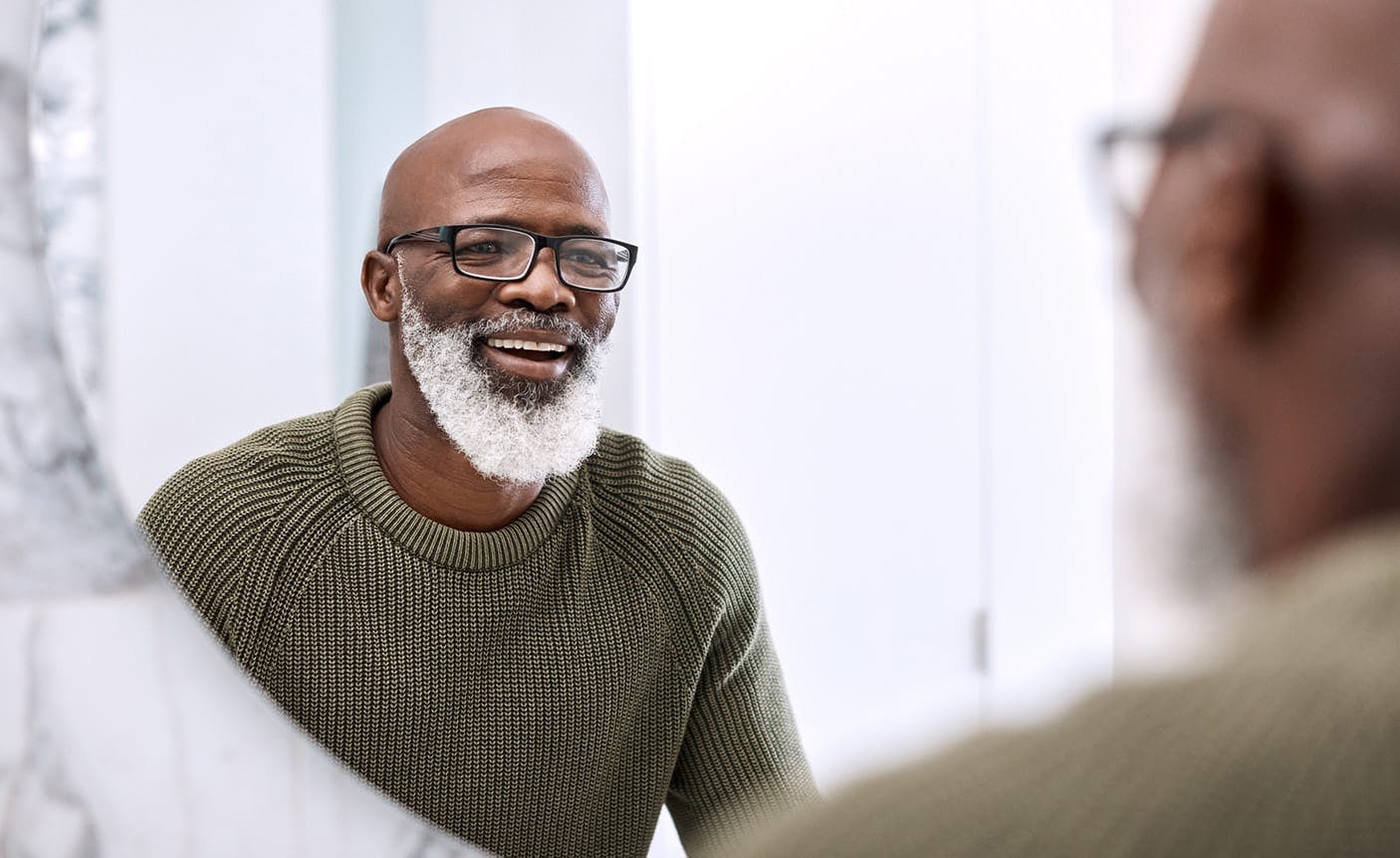 man looking at a tablet