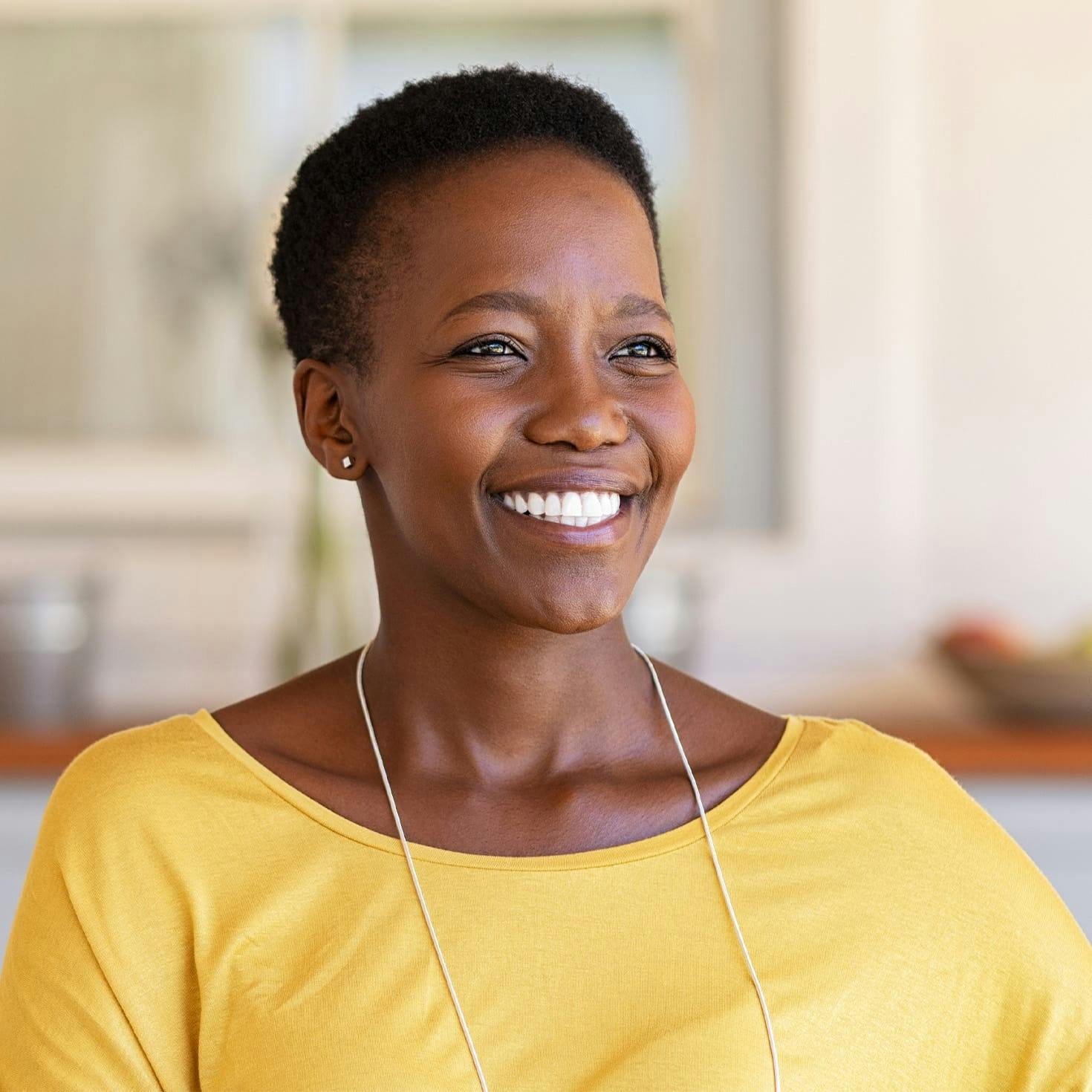 older couple walking with their arms around each other