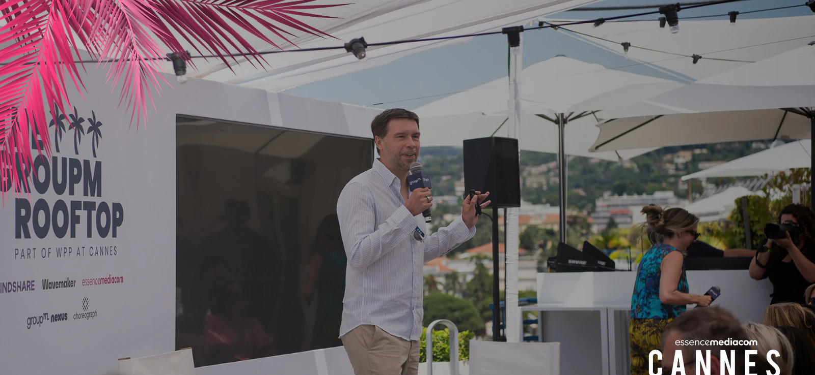 An image of Vincent Rebeix holding a mic at the EssenceMediacom panel on Generative AI at Cannes