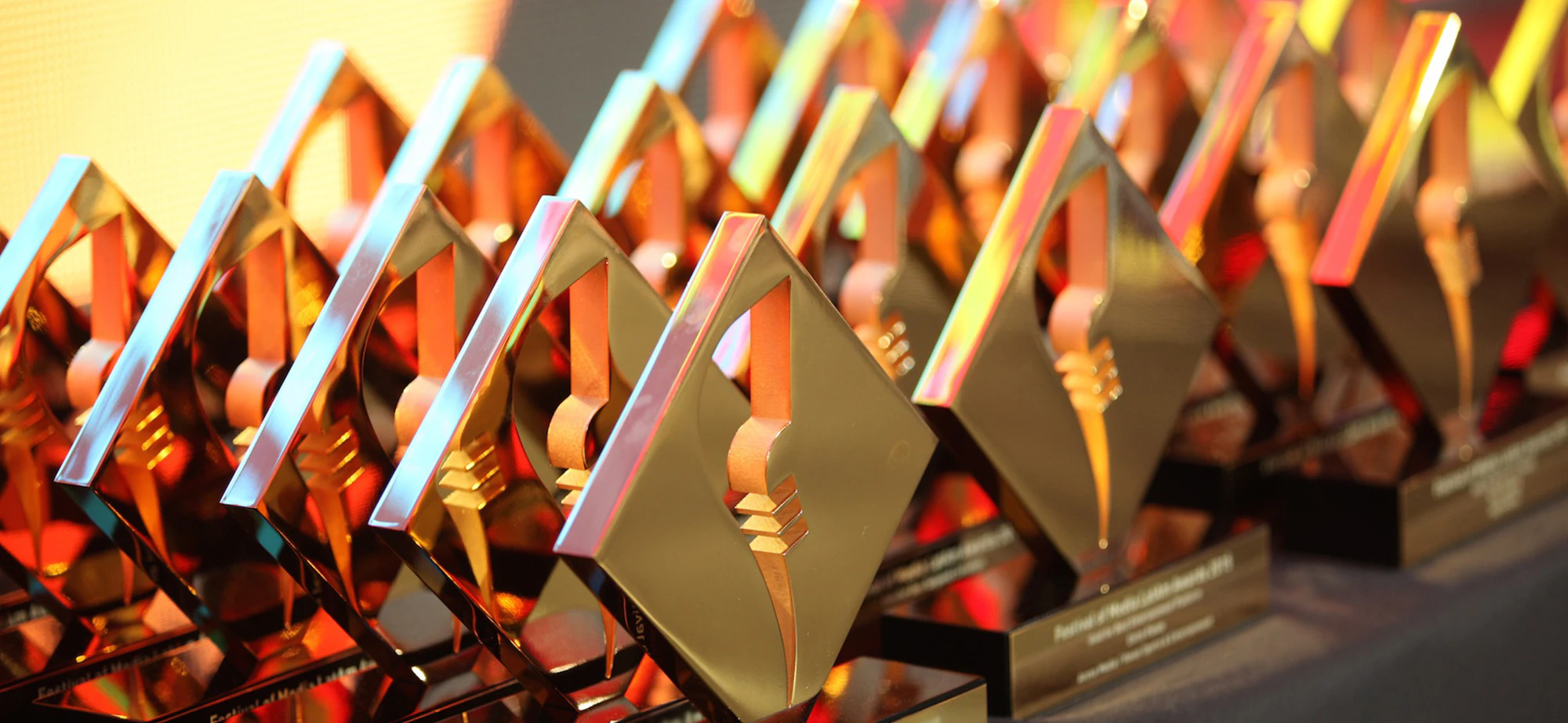 Rows of festival of media awards on a table