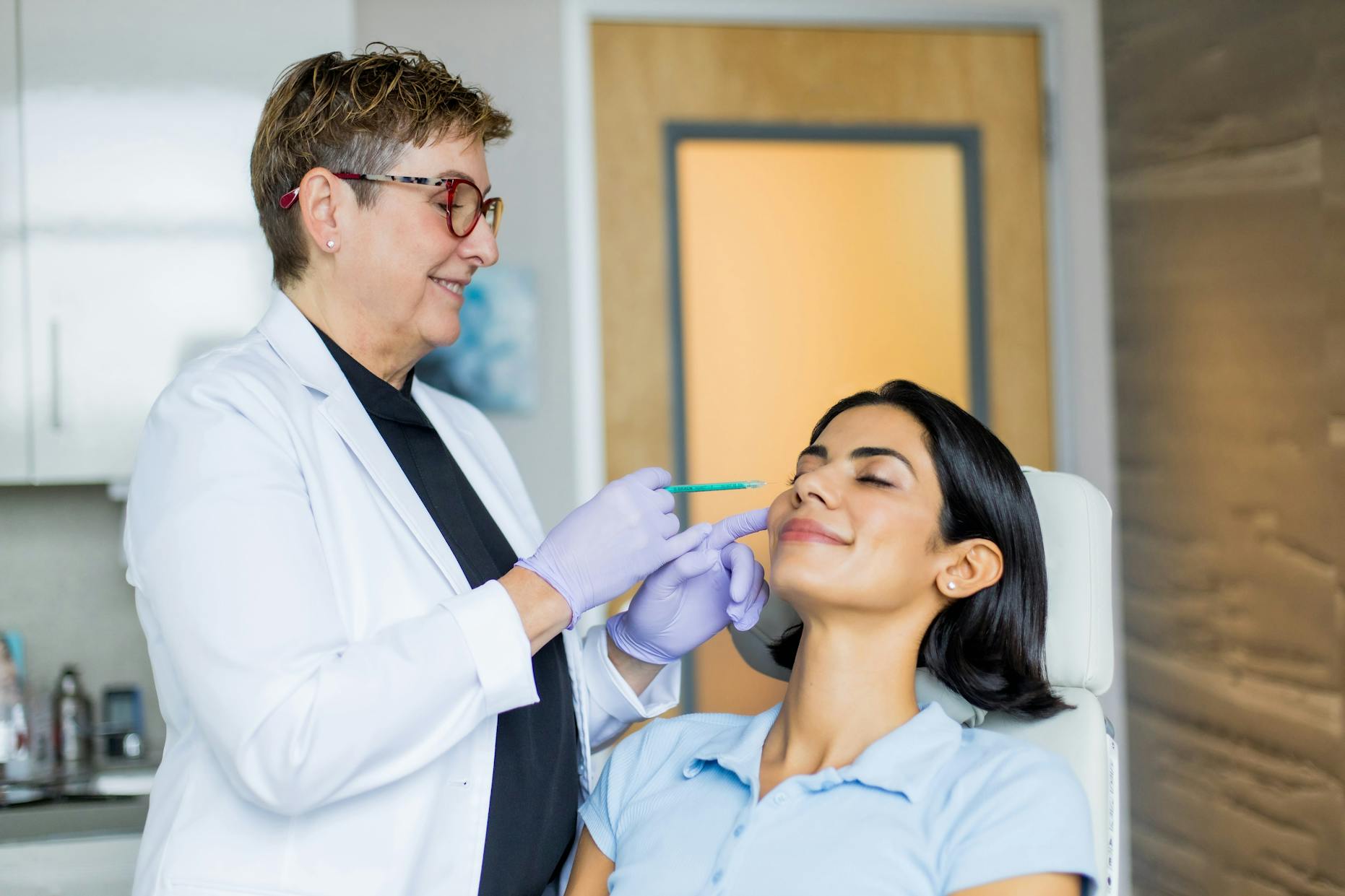 woman getting injectable treatment