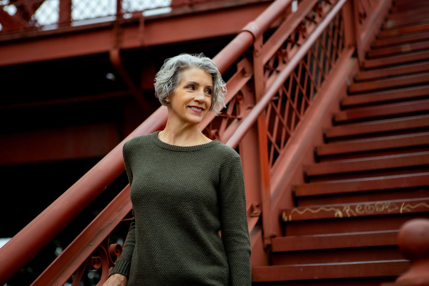 client walking down red stairs