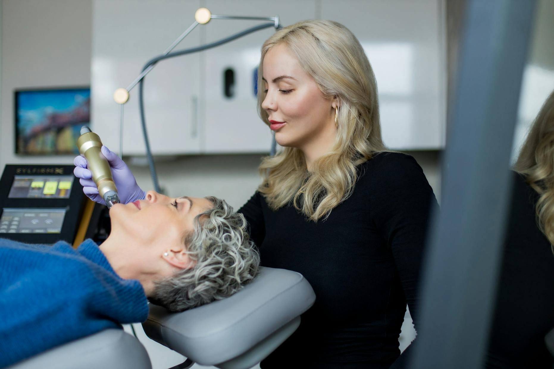 nurse microneedling on client's face