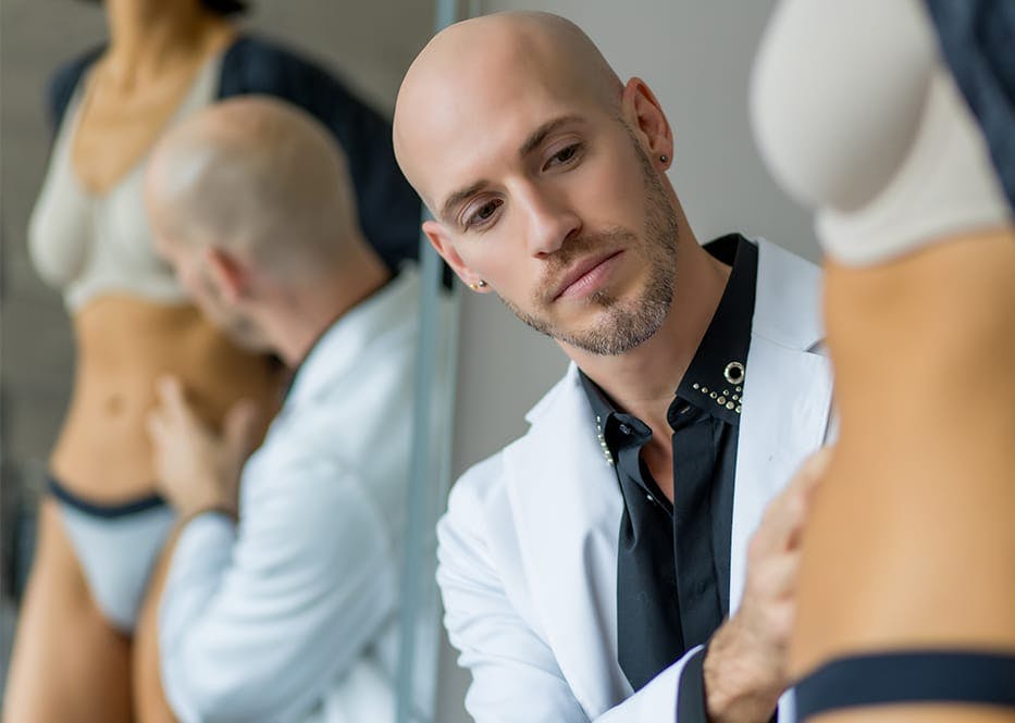 doctor looking at client's stomach
