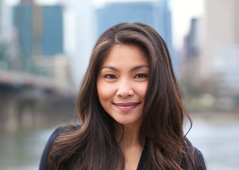 woman smiling with river in the background