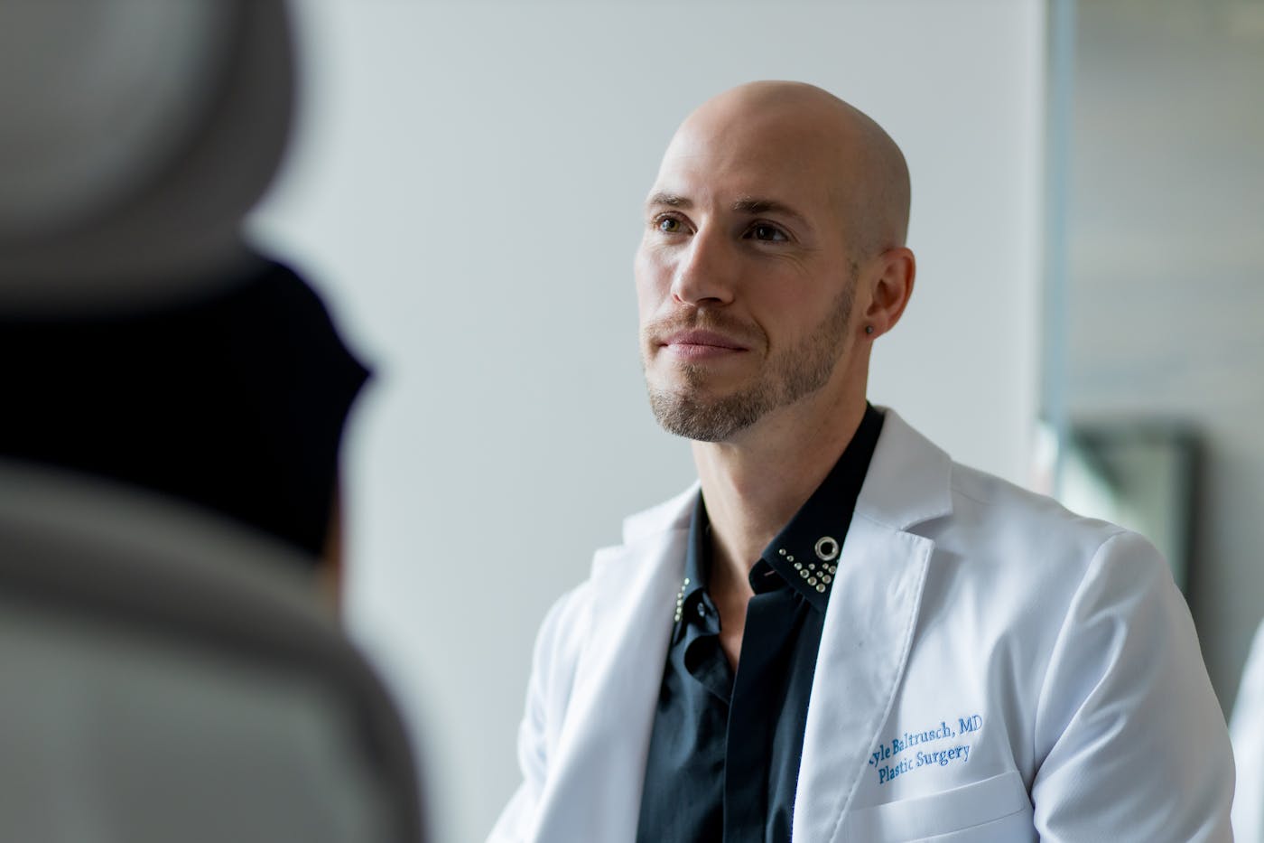 Dr. Kyle Balstrusch with patient