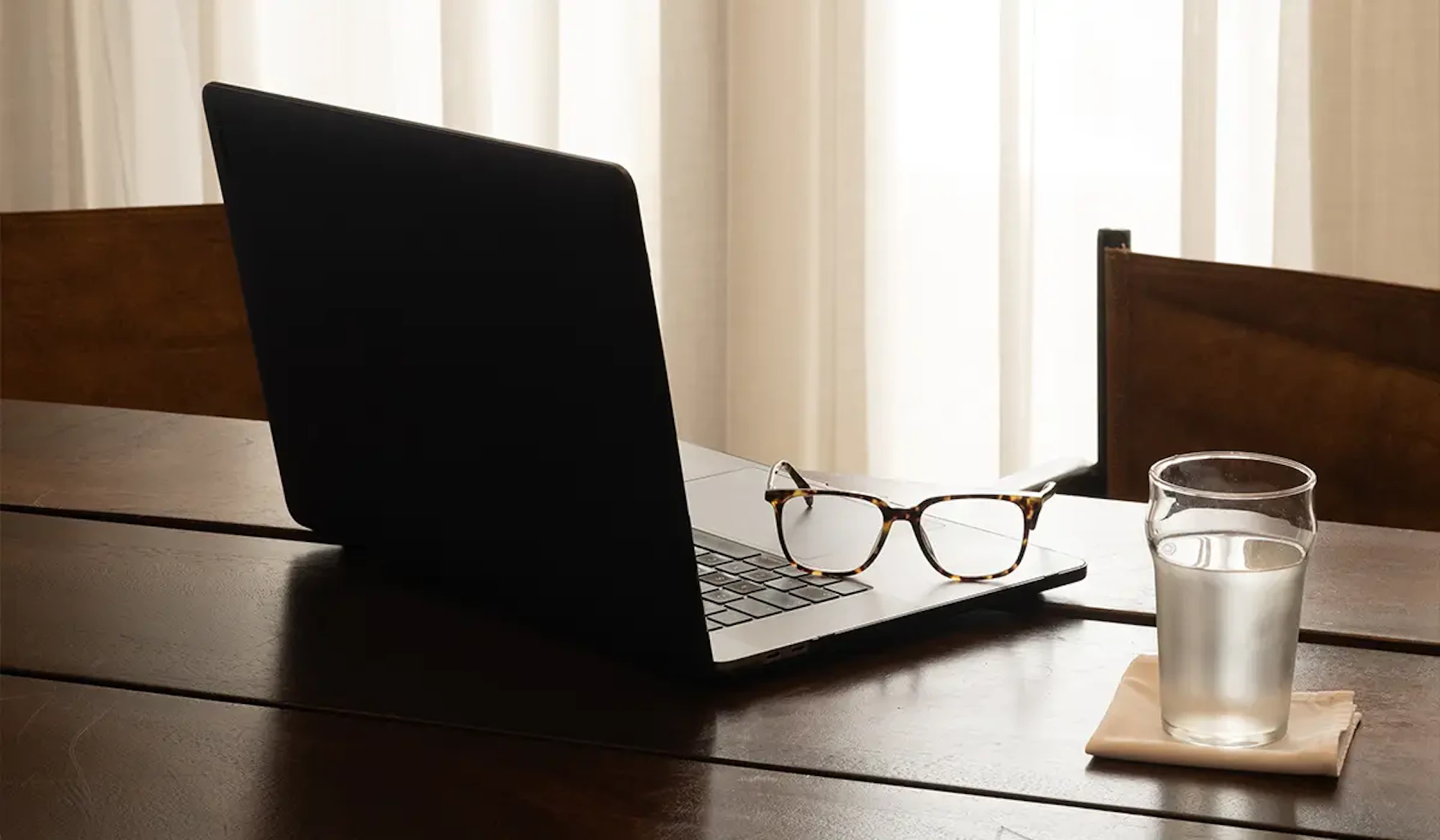 Laptop water and glasses