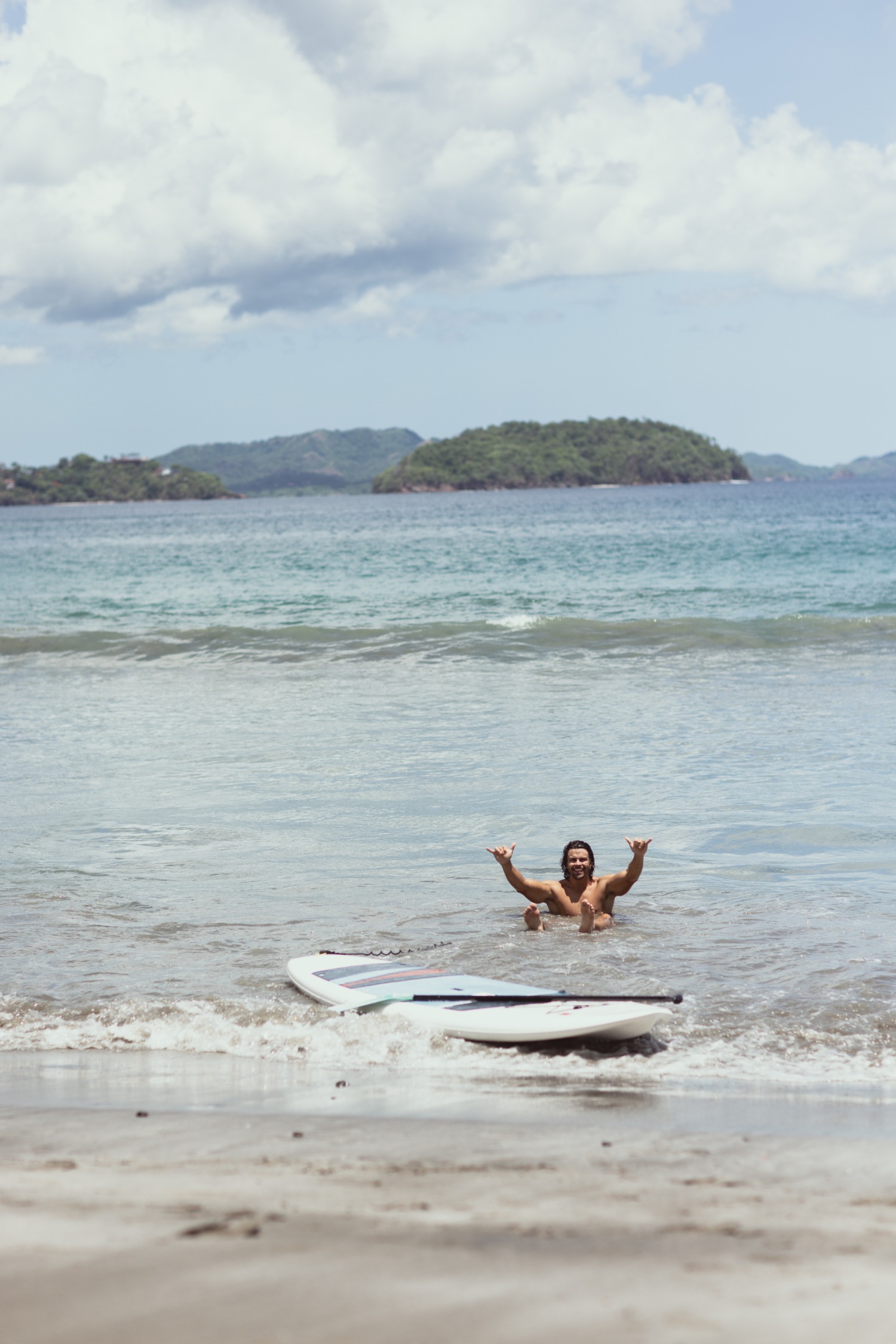 a person in the ocean surfing