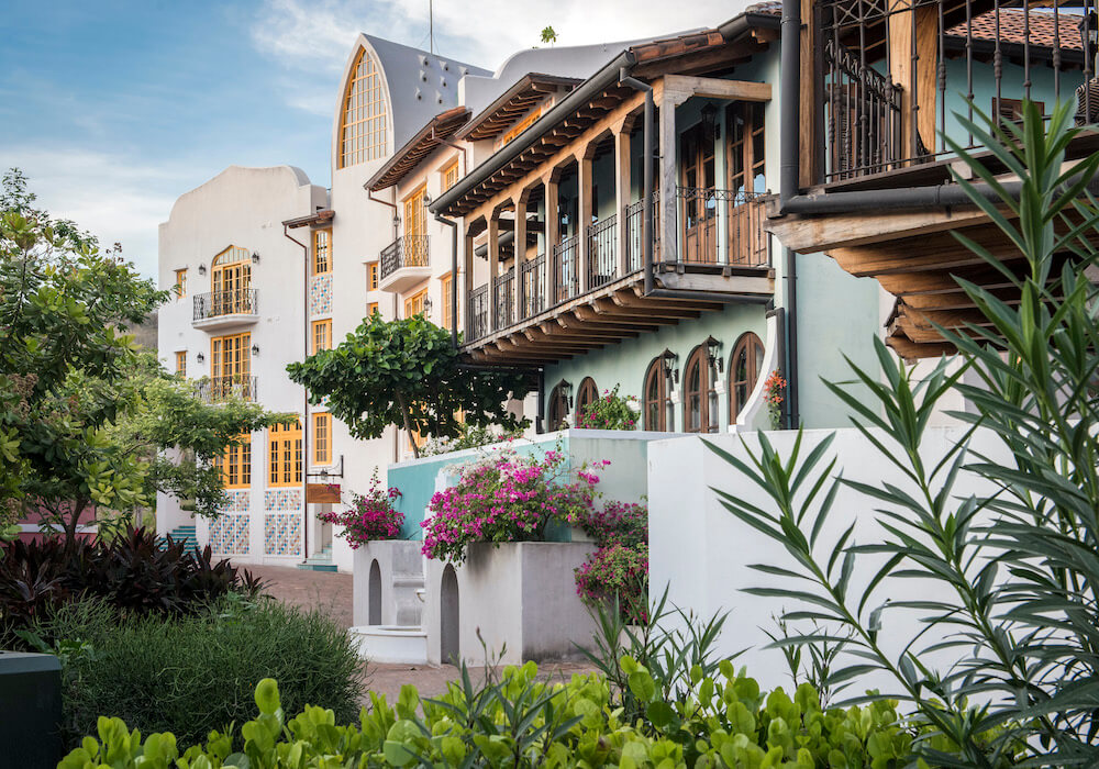 building facades with nearby flora and fauna