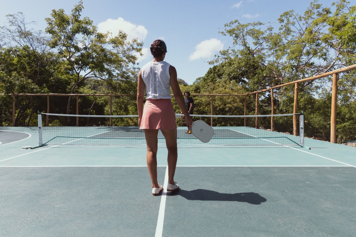 Woman playing pickleball