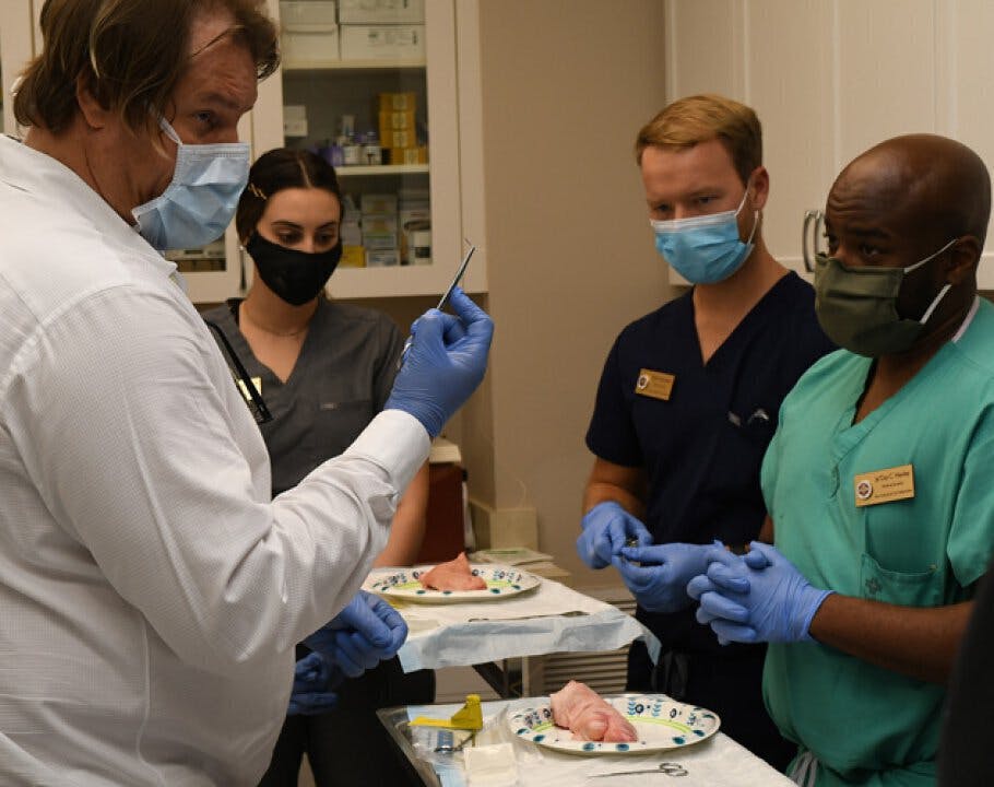 Stitchin’ time: Vero plastic surgeon trains future suturers
