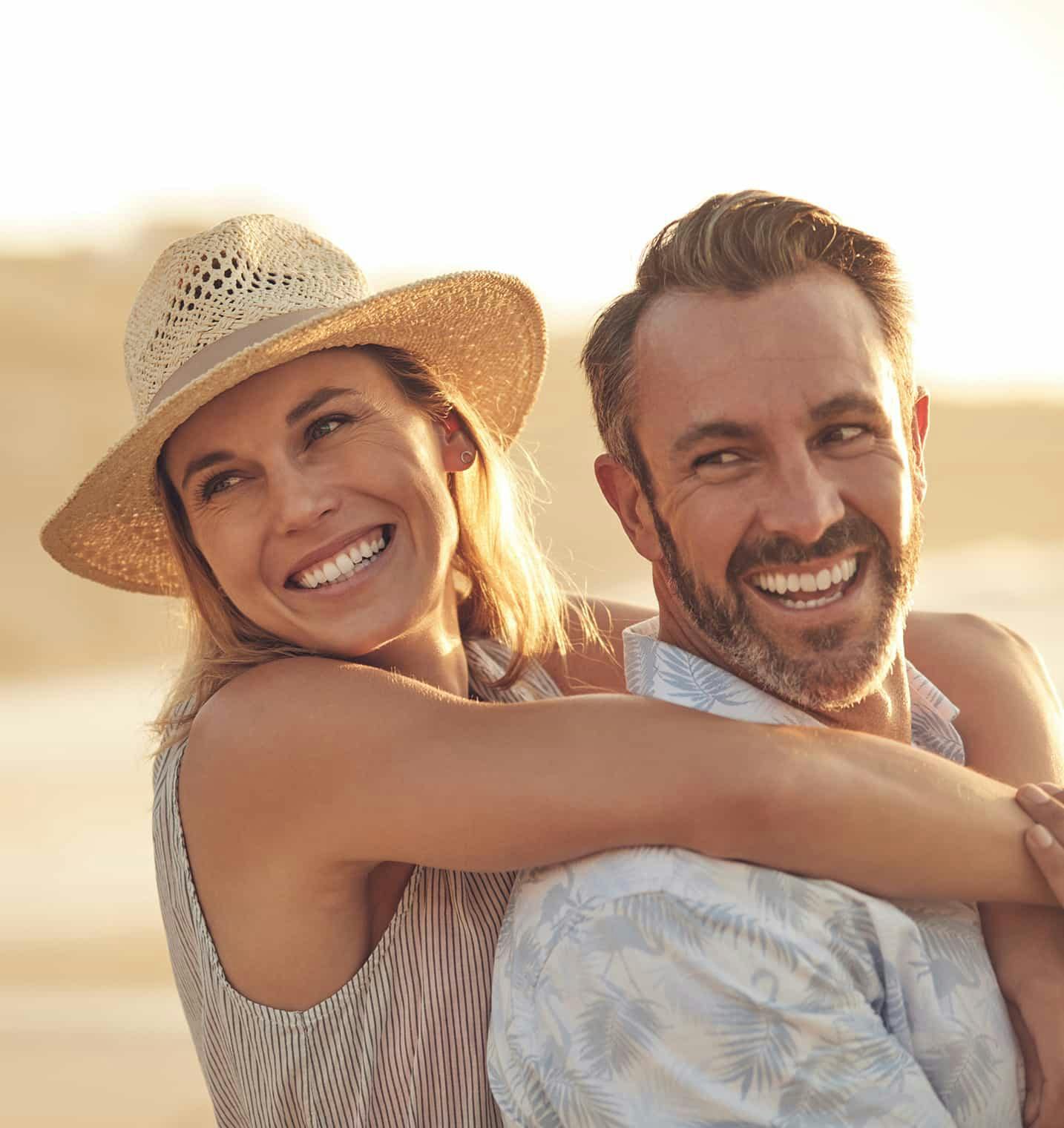 man and woman smiling