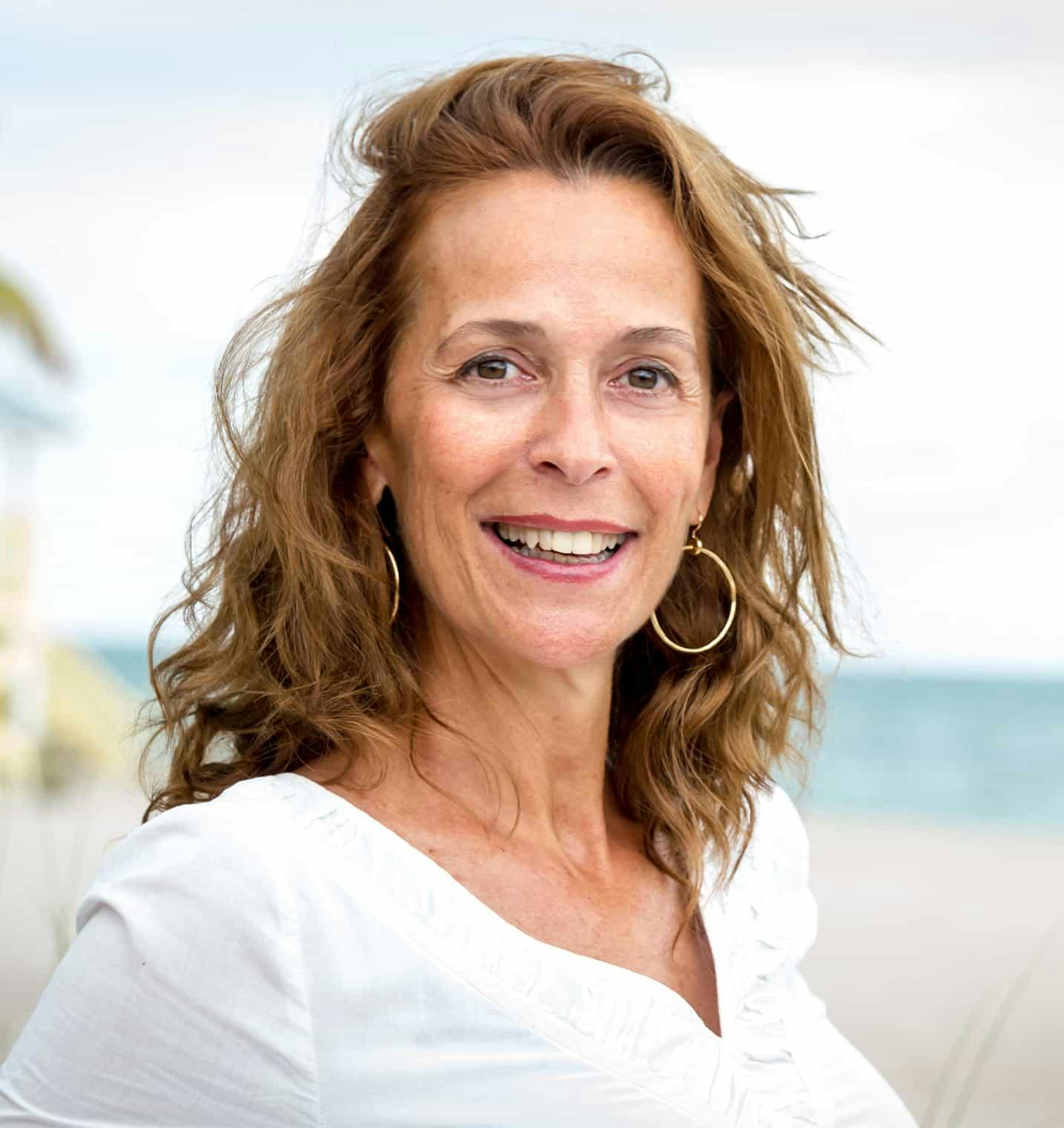 woman outdoors smiling