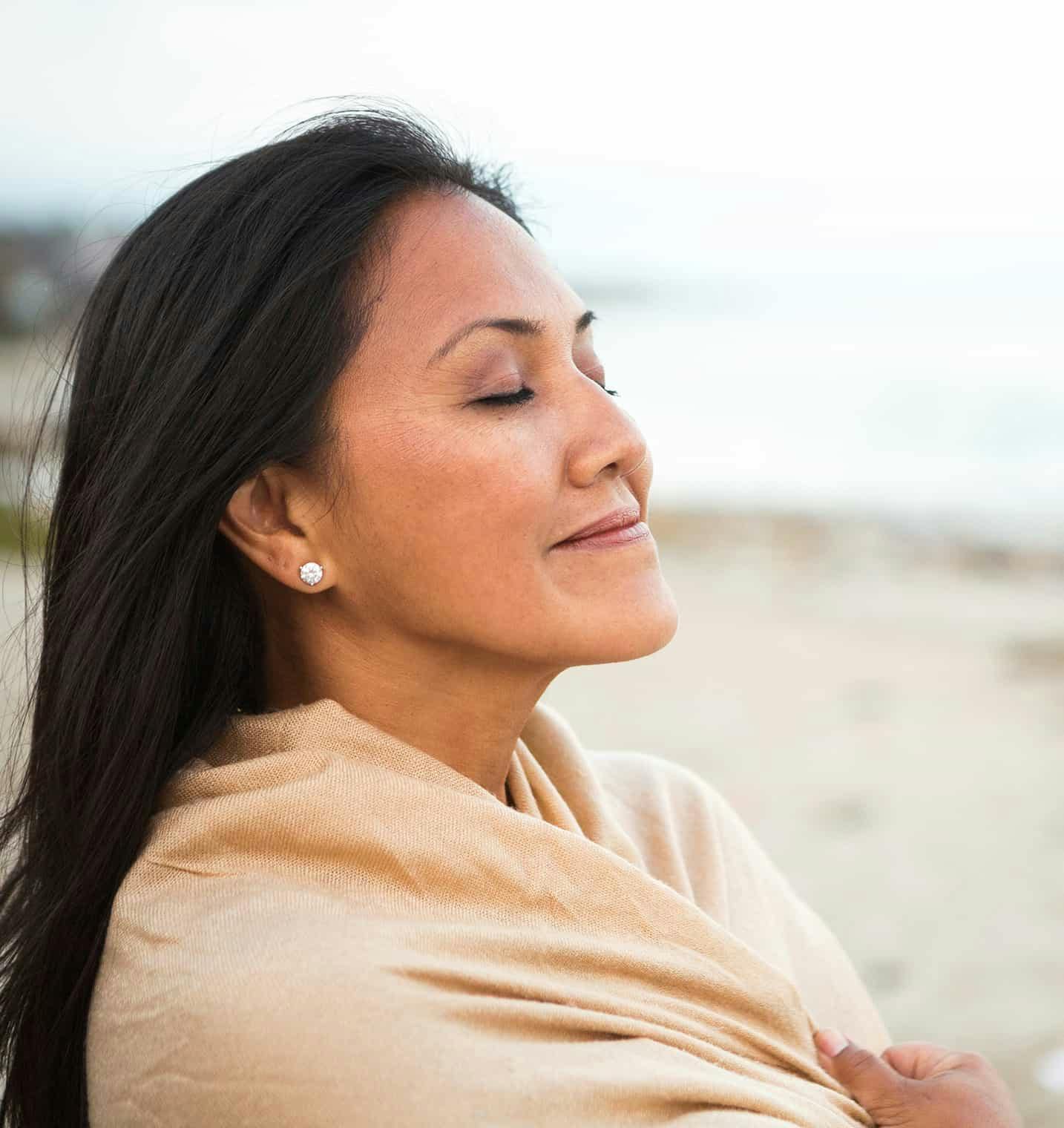 Woman outside smiling