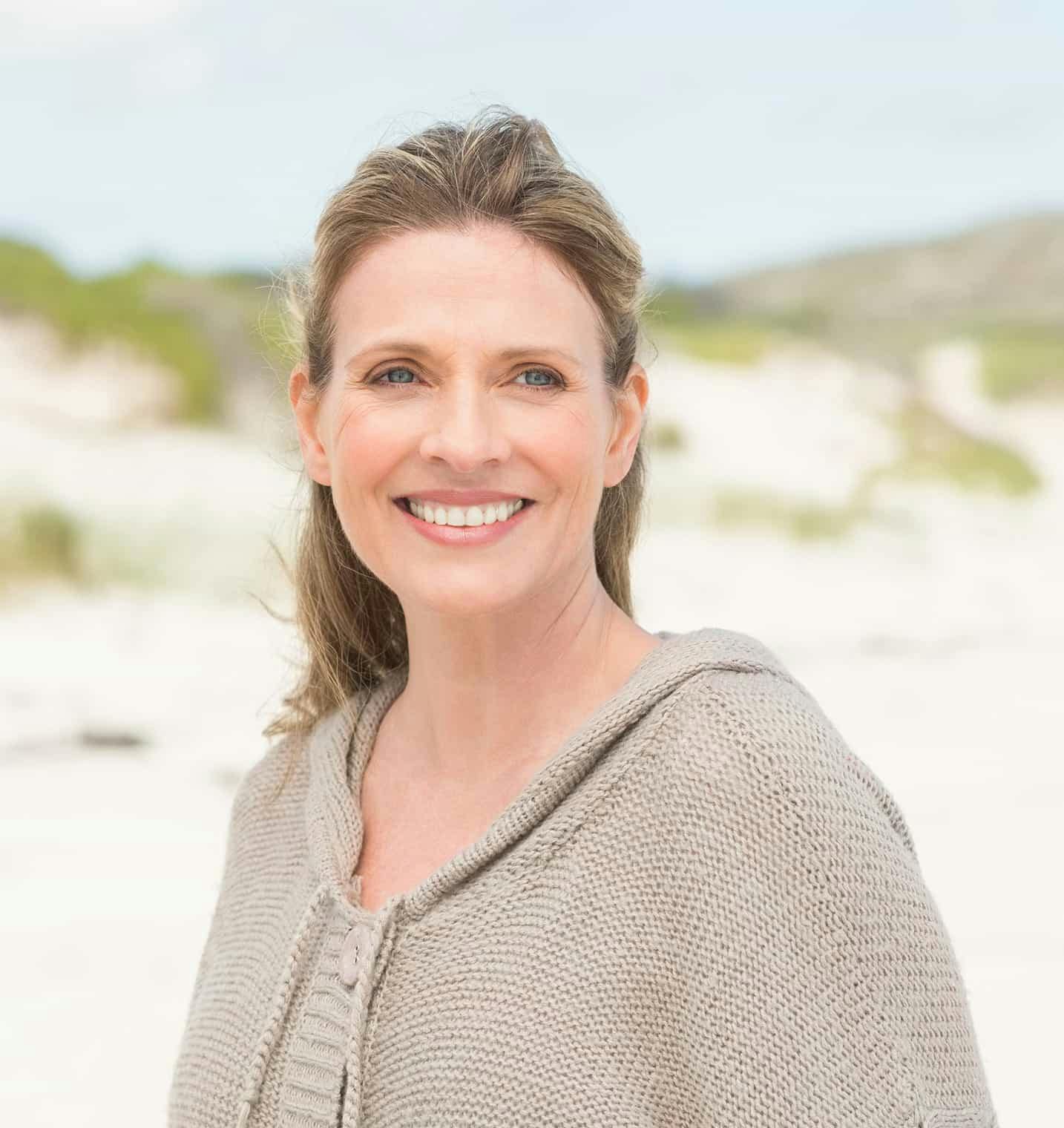 Woman outside smiling