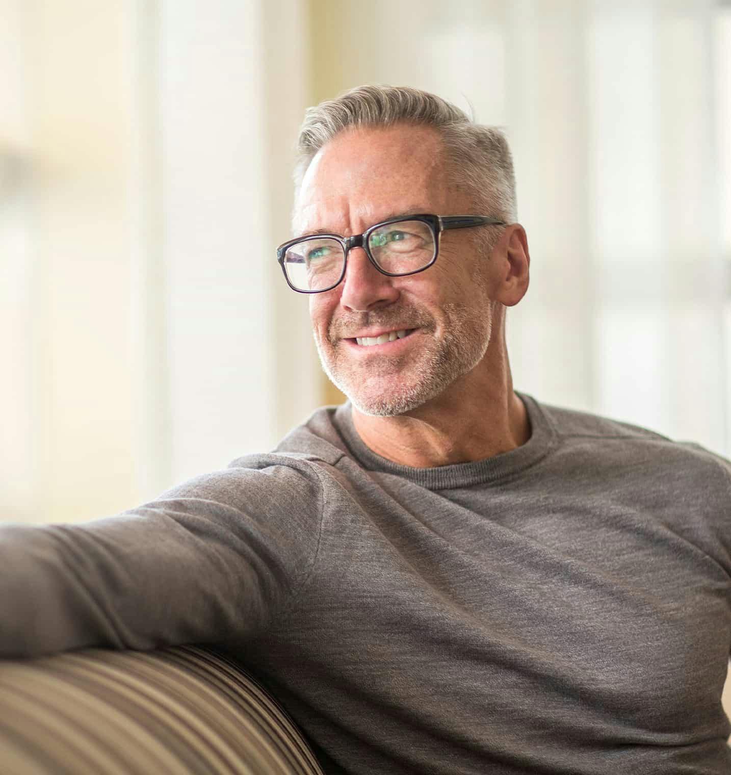 Man in glasses smiling