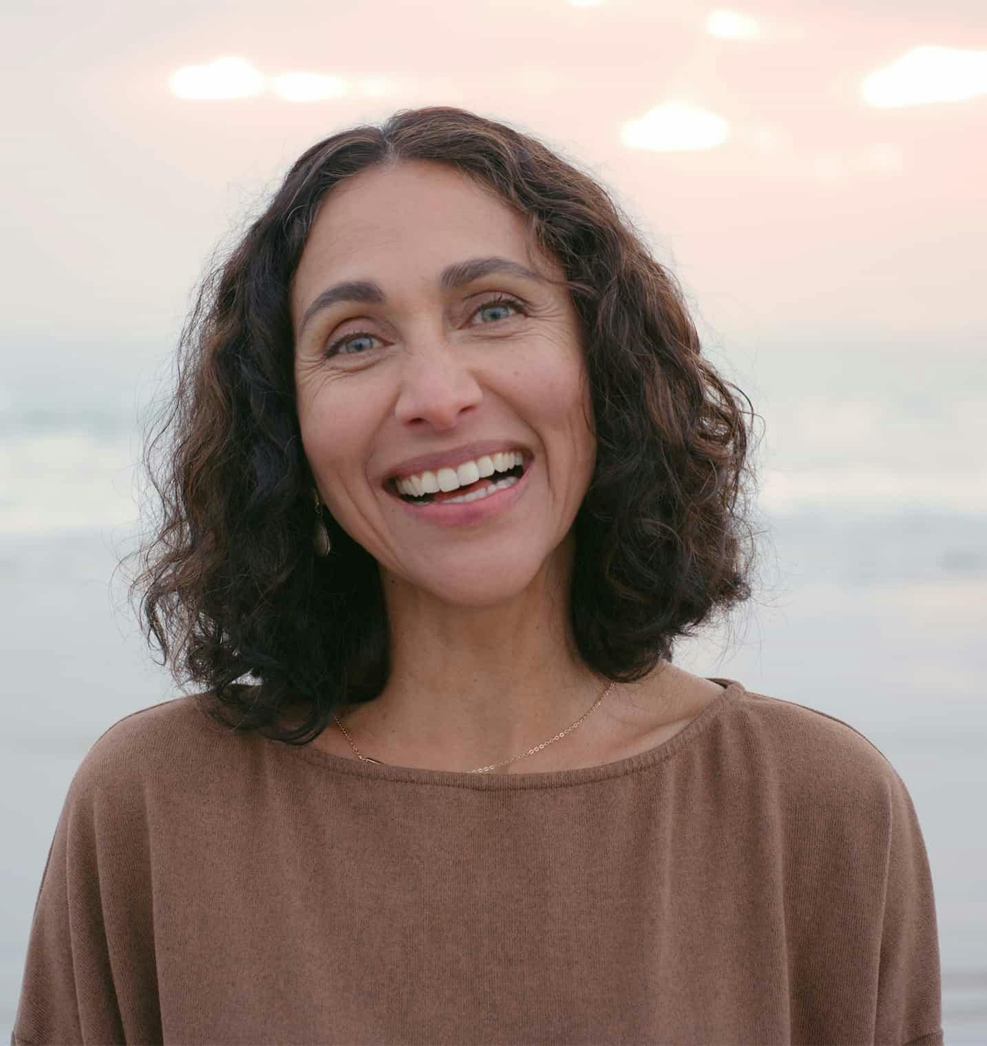 Woman outdoors smiling