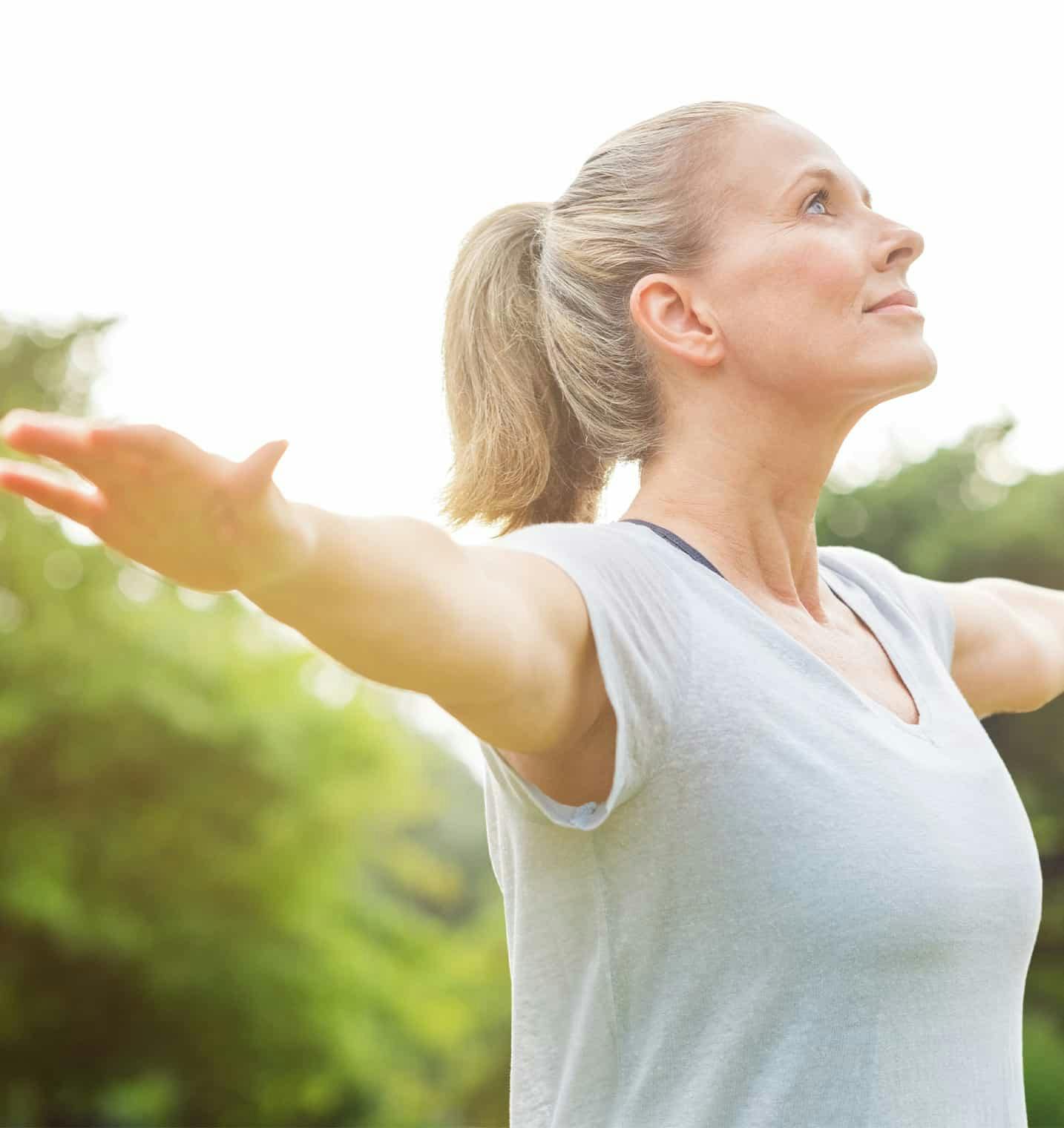 Woman with arms outstretched