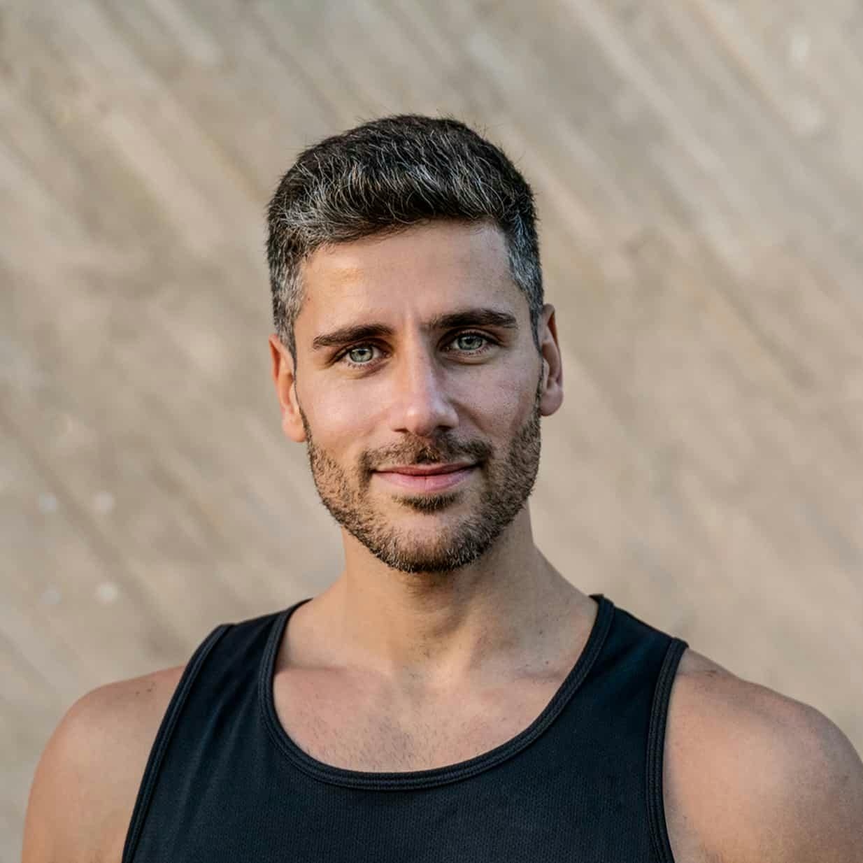 Man in black tank top