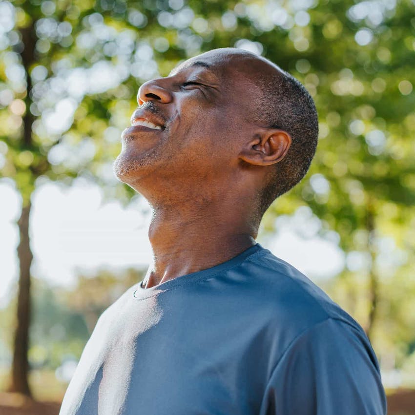 Man smiling in the sun