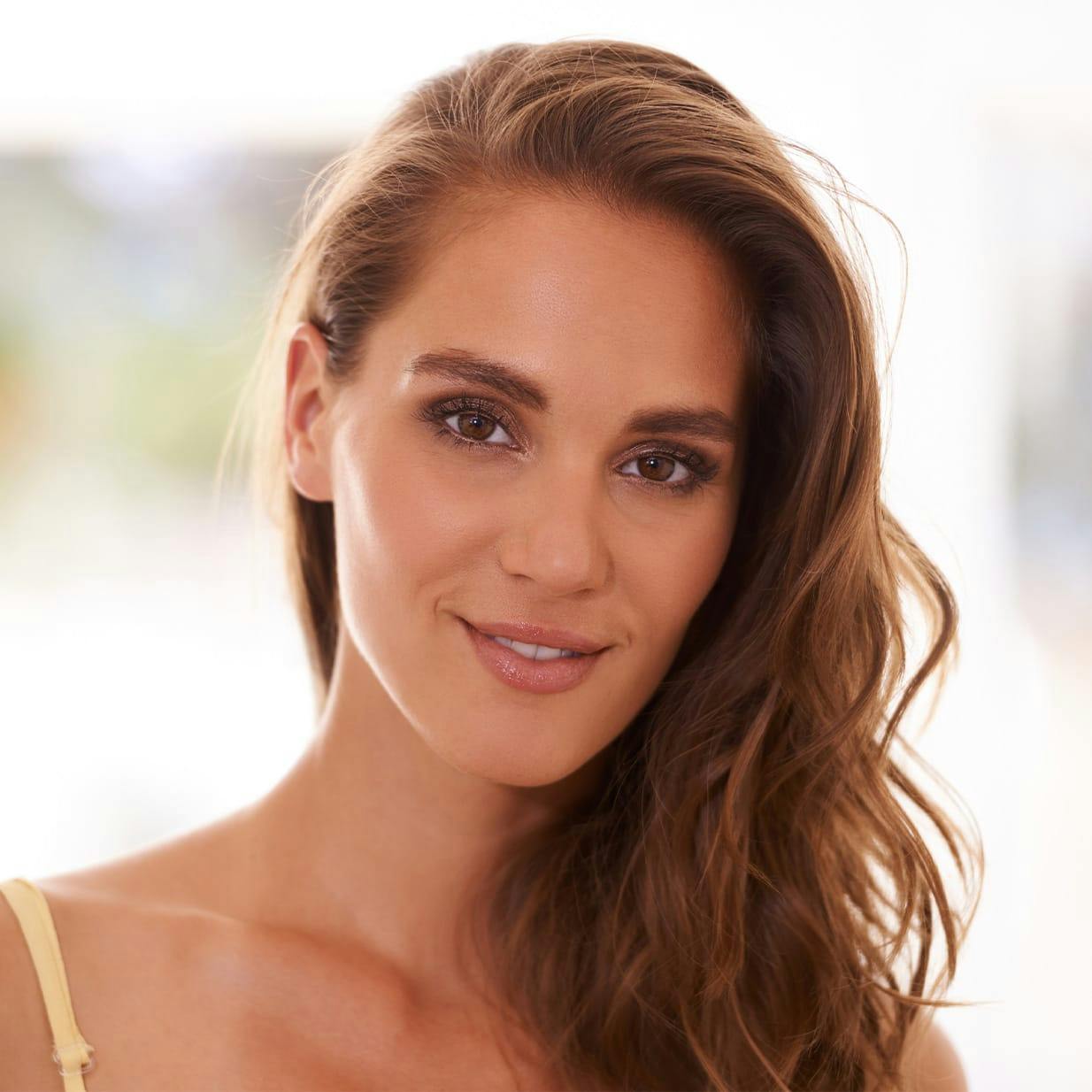 Woman in yellow top