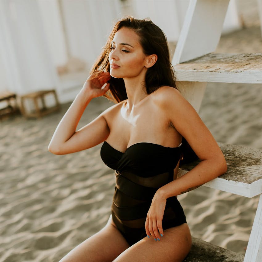 Woman in swimsuit at the beach