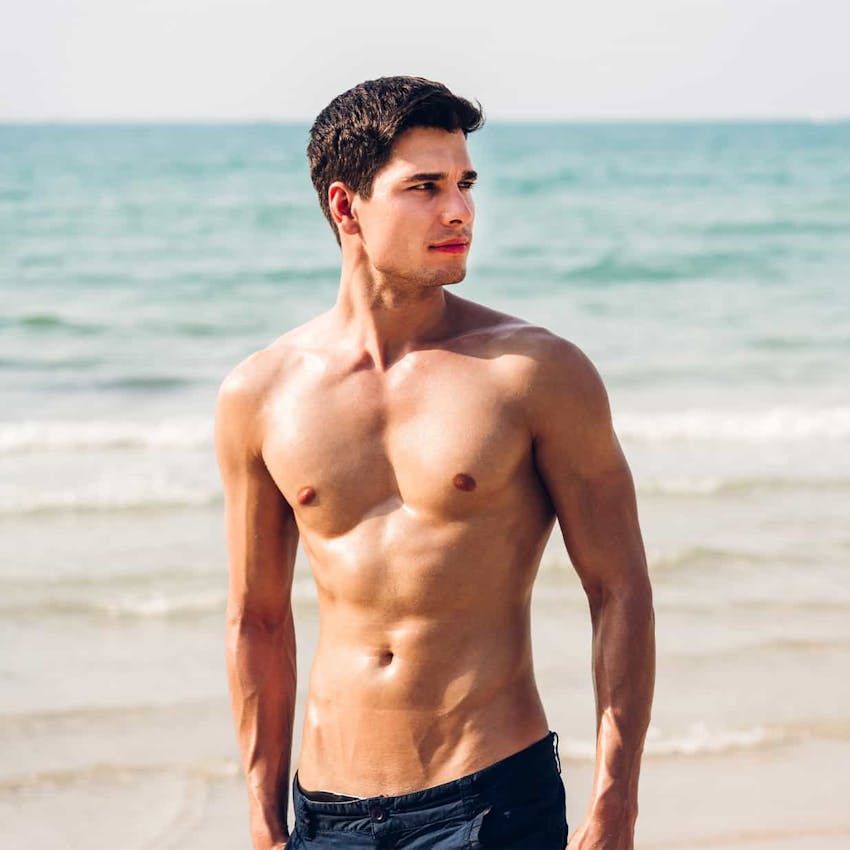 man standing on the beach