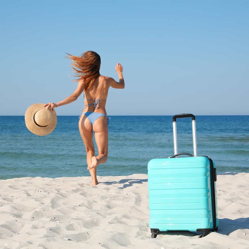 woman running into the water