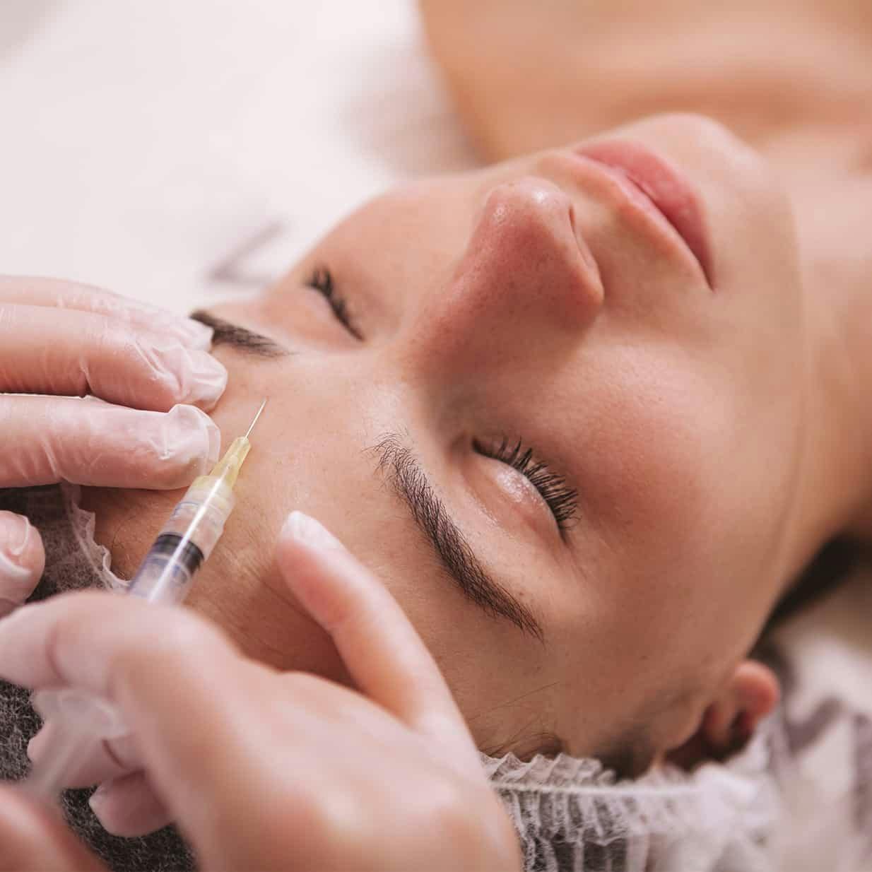 Woman receiving injectable