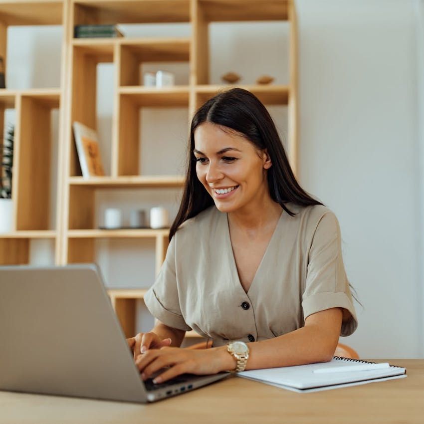 Man holding a surfboard above his head