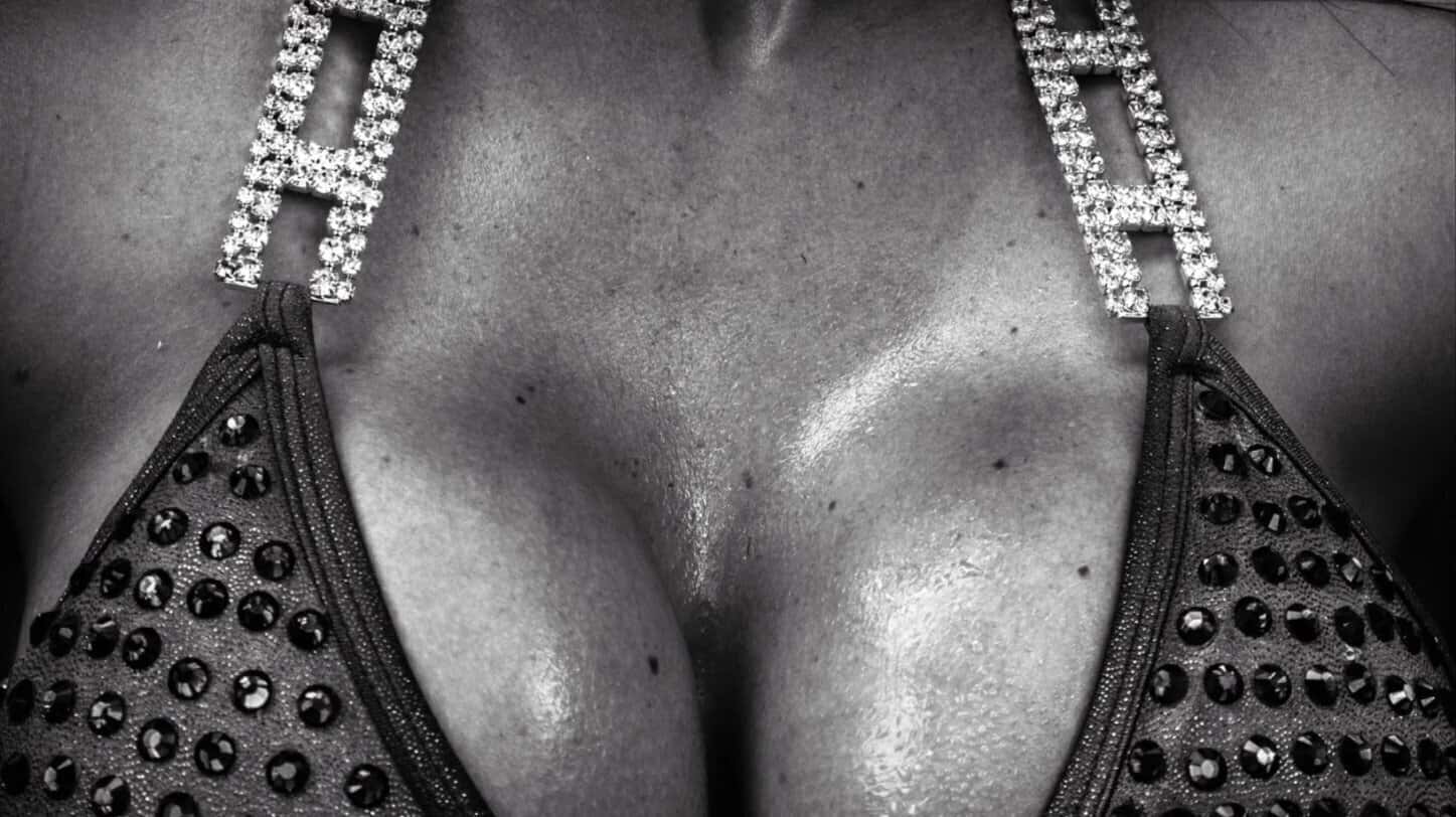 woman's chest in a sequined bra top